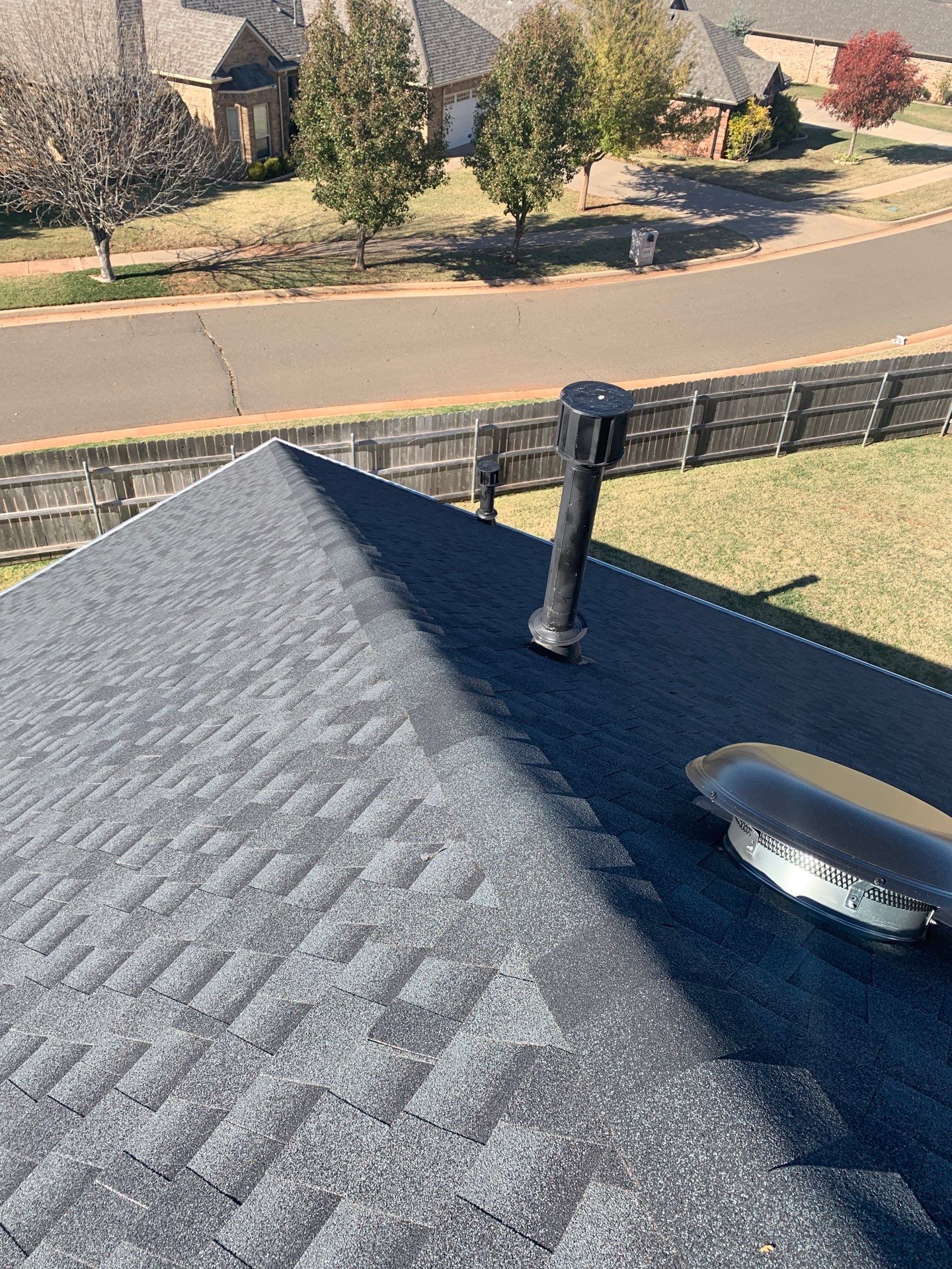 roof replacement & gutter installation in Edmond by McCann's Roofing and Construction