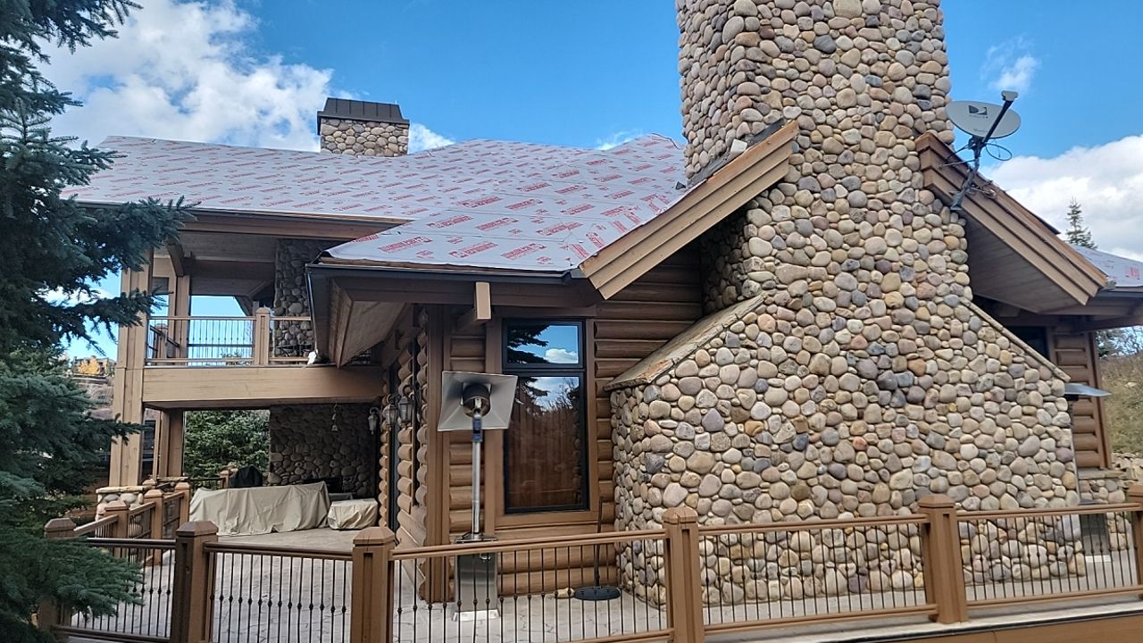 Standing Seam Metal Roof Replacement After Snow Damage by ASAP Roofing & Restoration