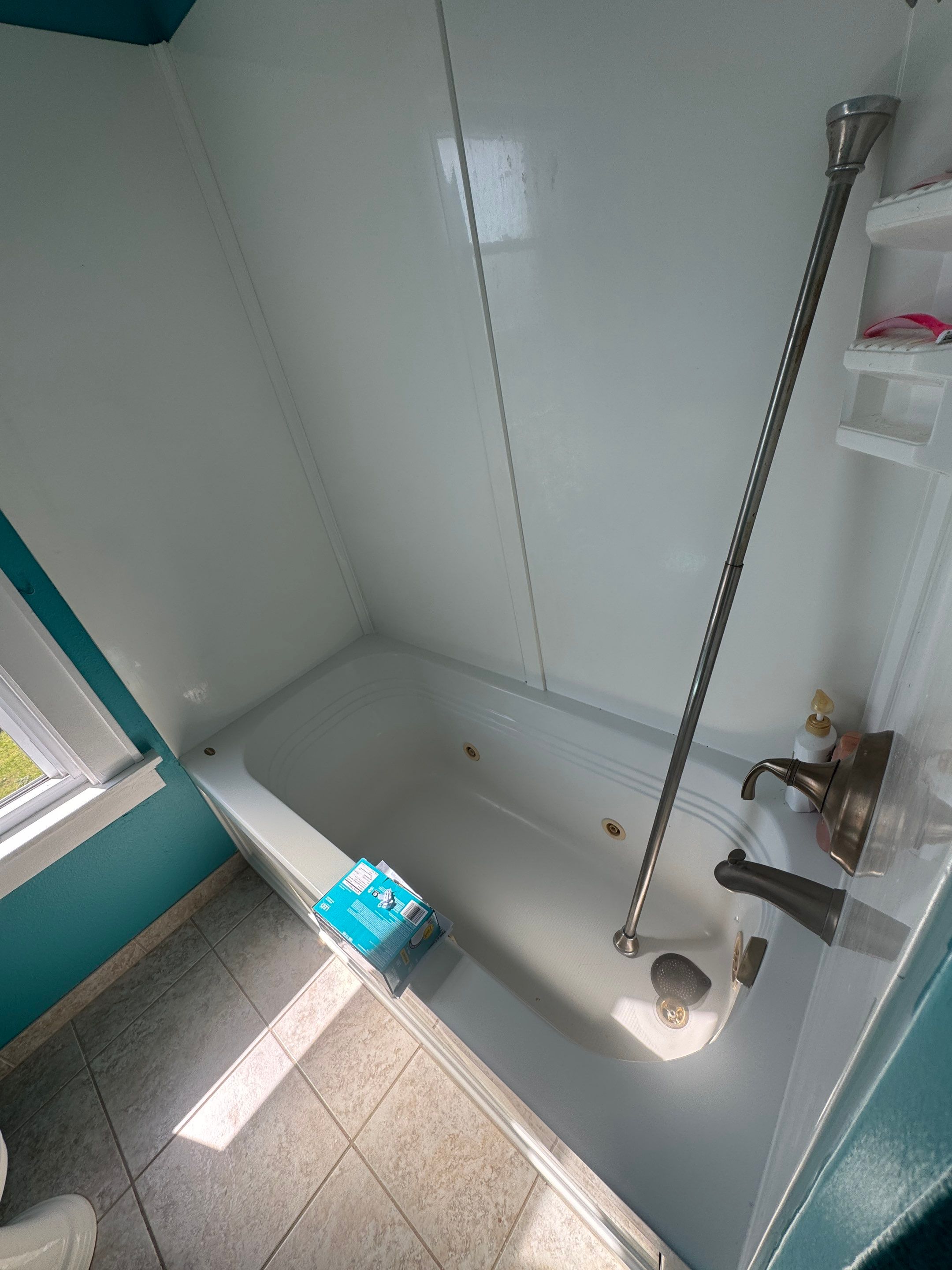 Milwaukee Bathroom Refresh With Acrylic Shower And Updated Fixtures by OCS Contracting Services