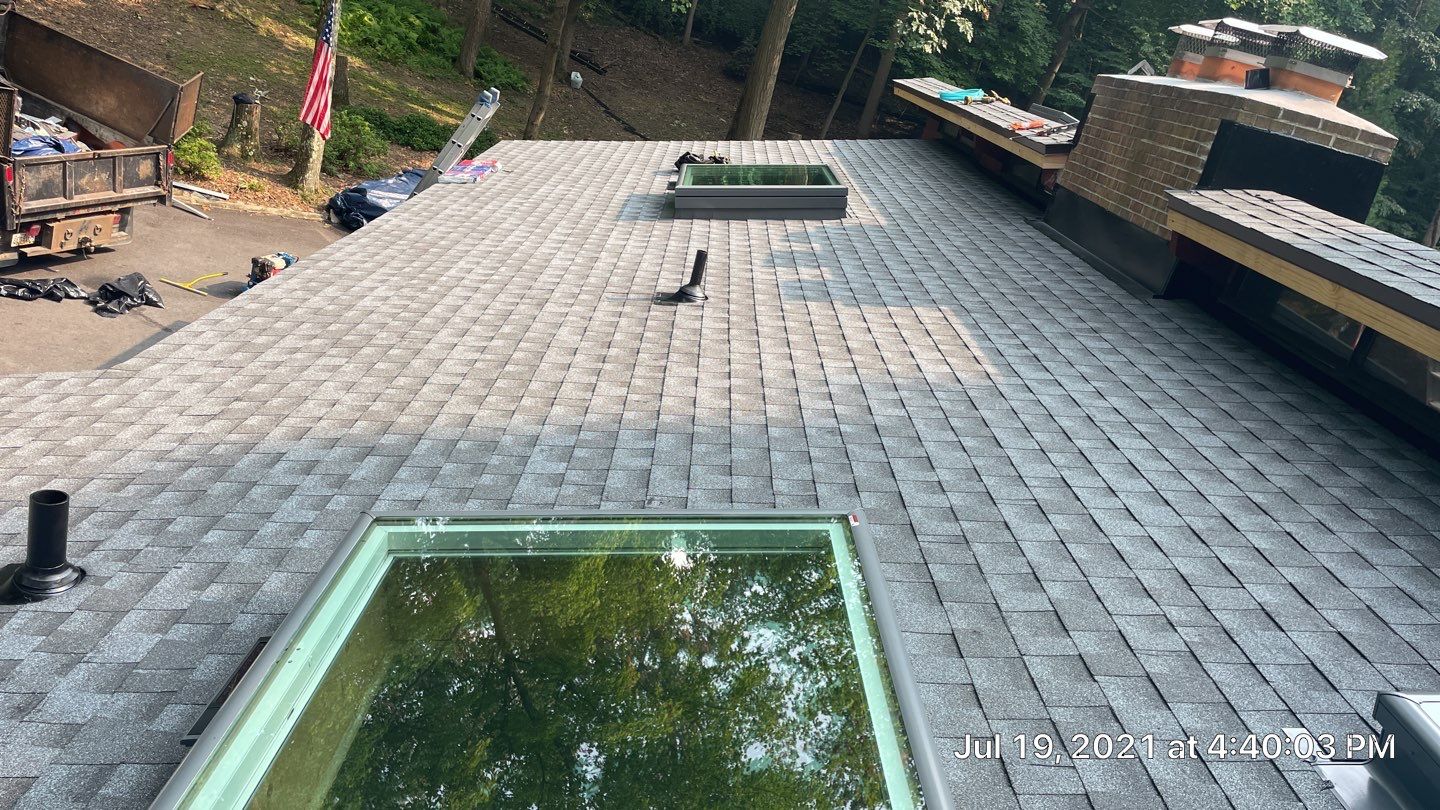 Deckhouse Roof Replacement by American Home Contractors