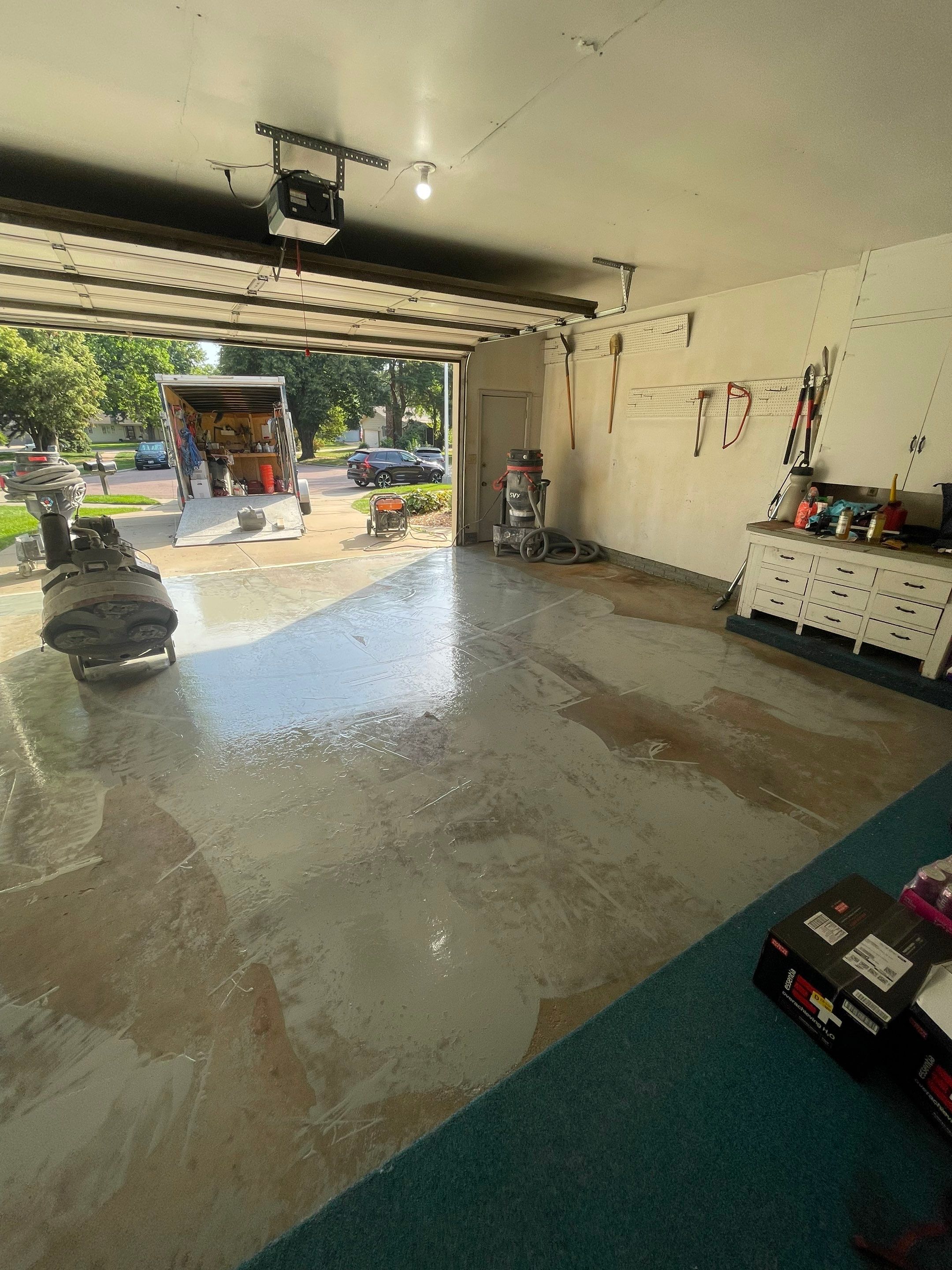 Custom Creekbed Garage Floor Coating in Sioux Falls by Select Painting, Coatings & Garage Cabinets