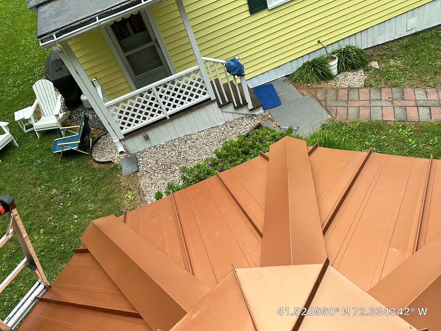 Residential Roofing Installation using Copper Penny Metal Roof by A Plus Exterior