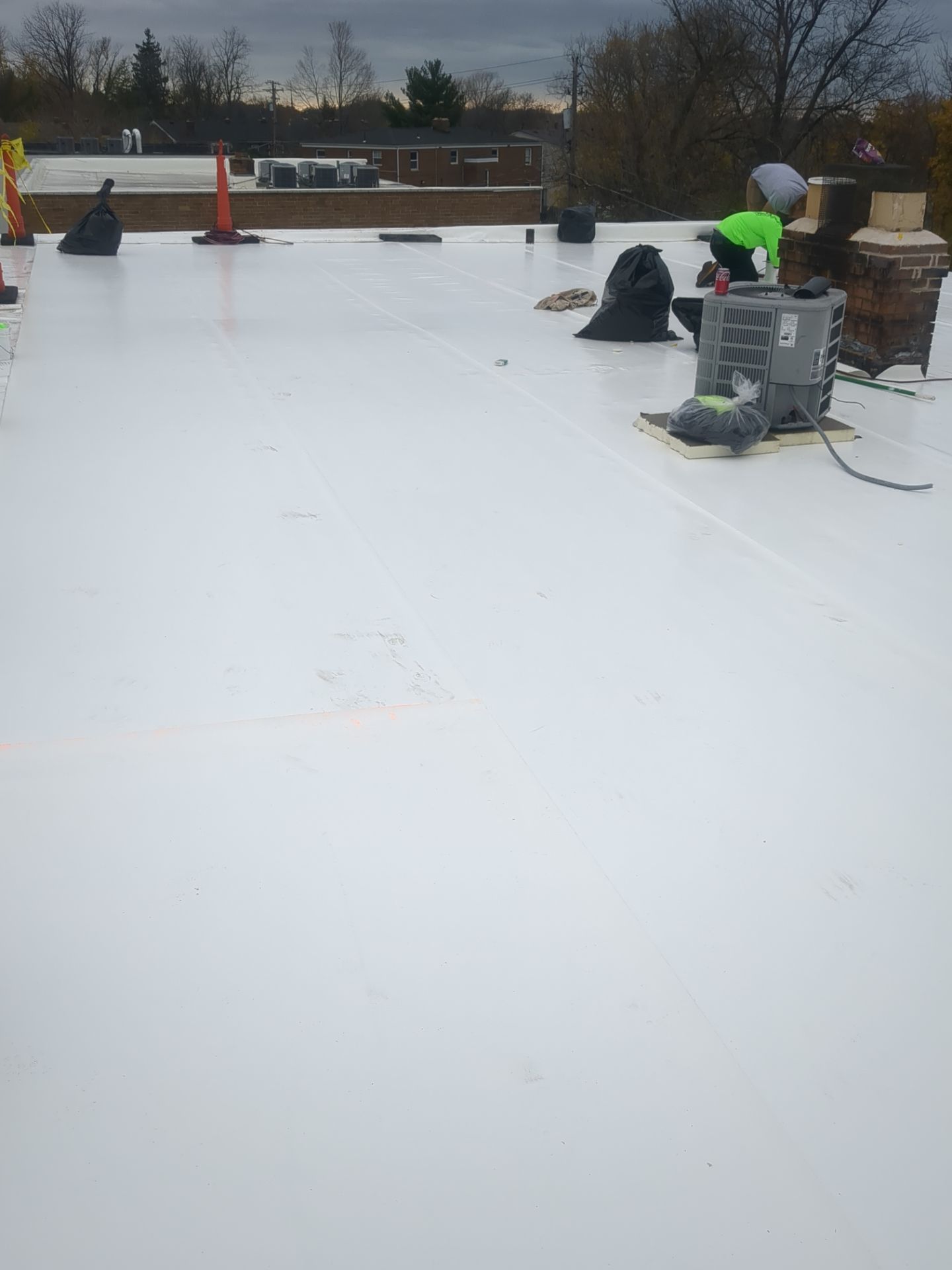 Commercial Roofing Installation using Duro-Last 50 mil PVC by 3 Daughters Construction 