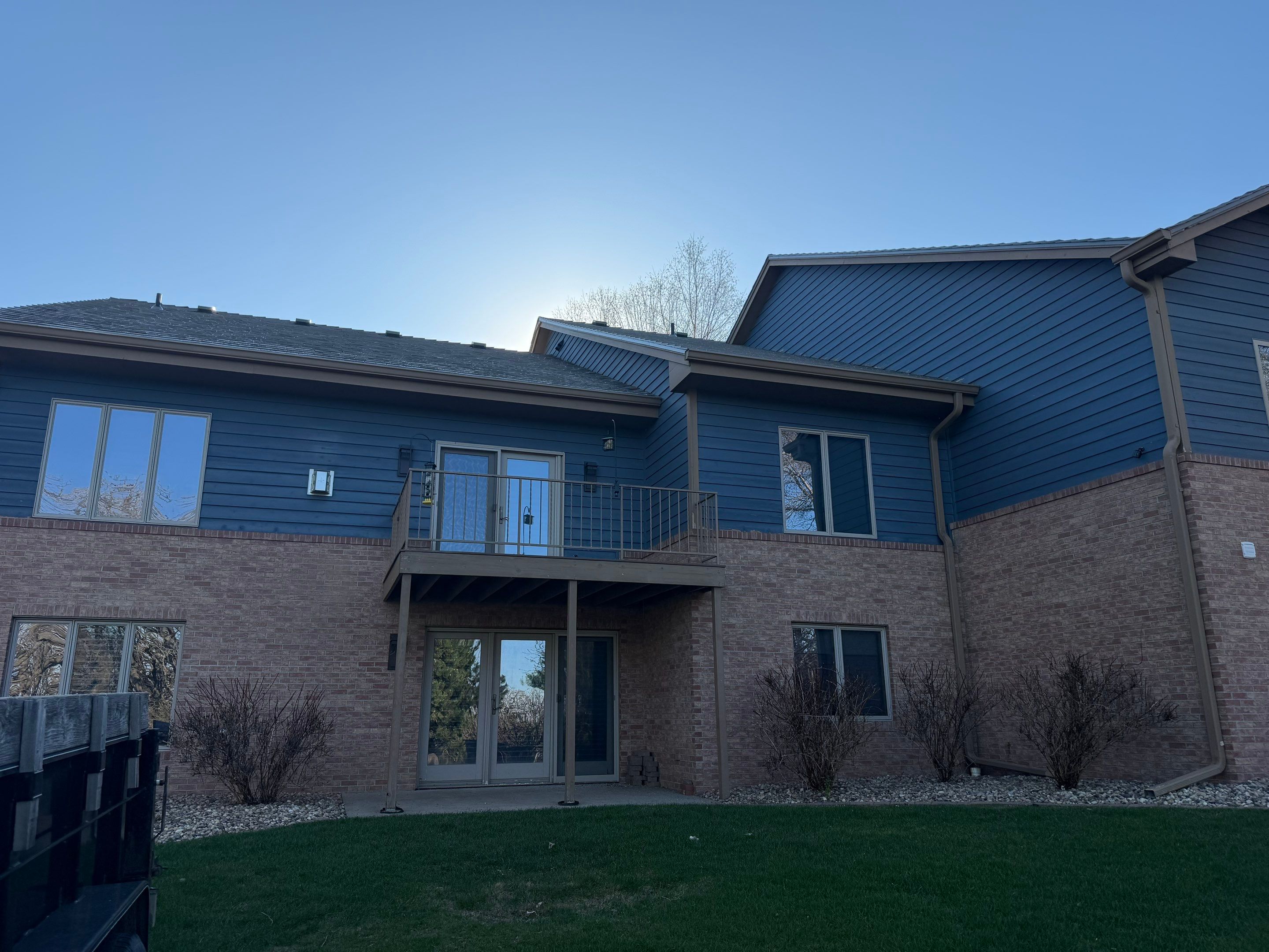 Residential Exterior Painting and Siding Refresh in Sioux Falls by Select Painting, Coatings & Garage Cabinets