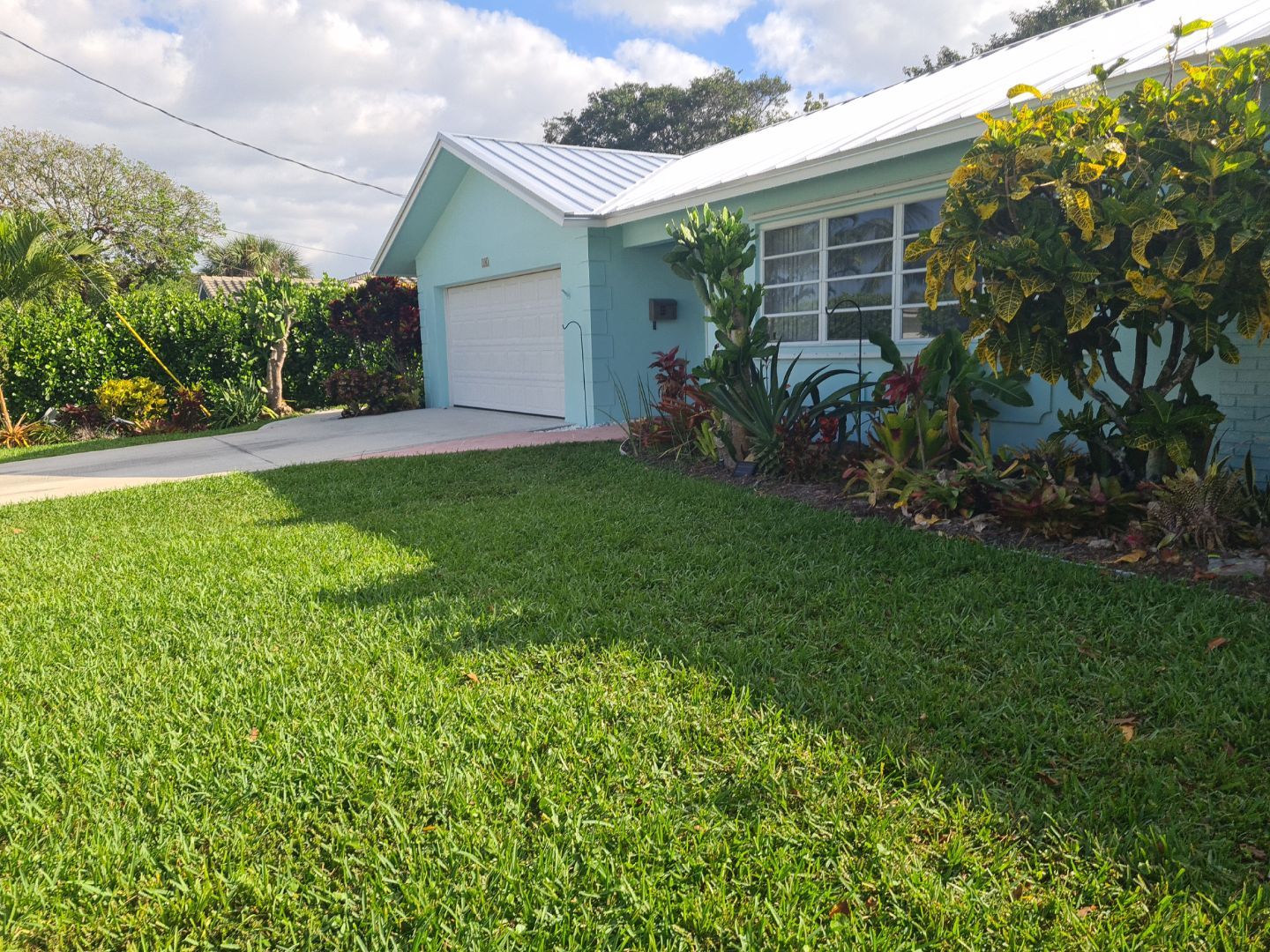Residential Roofing Installation using 1" Nail strip metal roof by BLUES BROTHERS CONSTRUCTION CORP