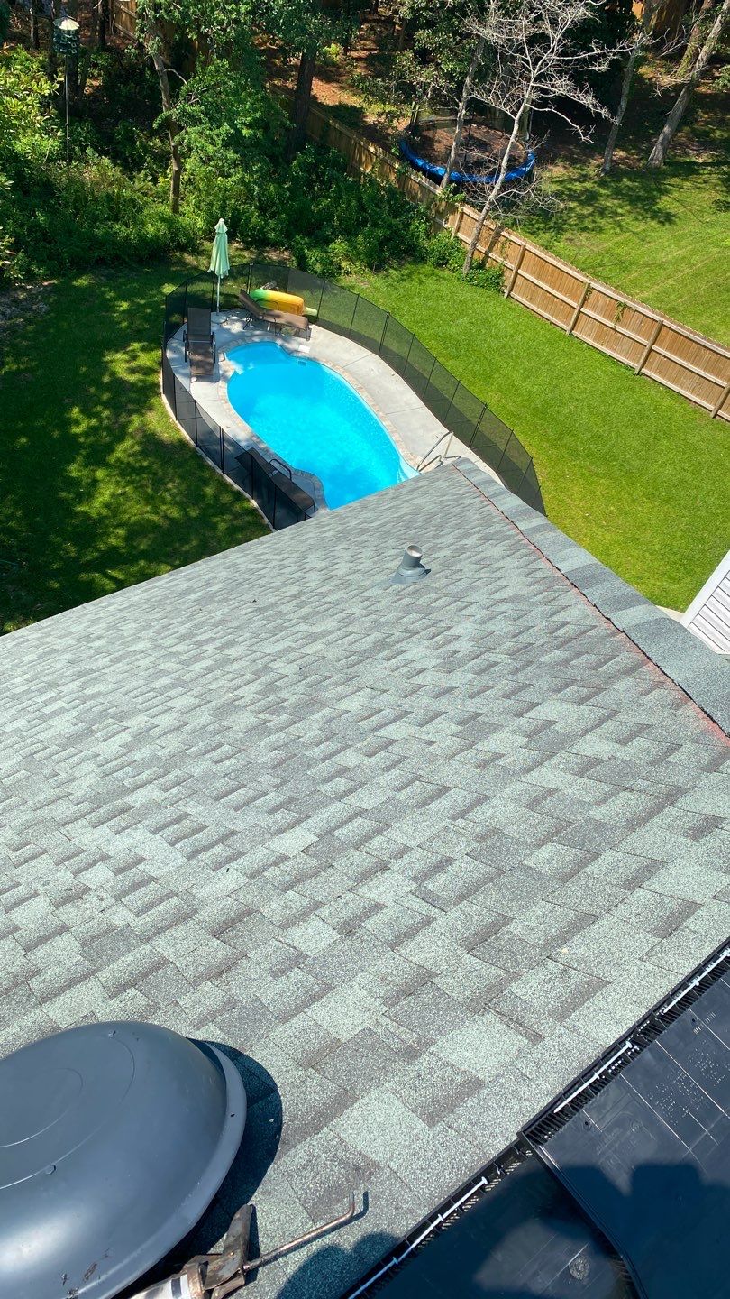 Residential Roofing Installation using Roof Replacement by American Roofing & Construction LLC