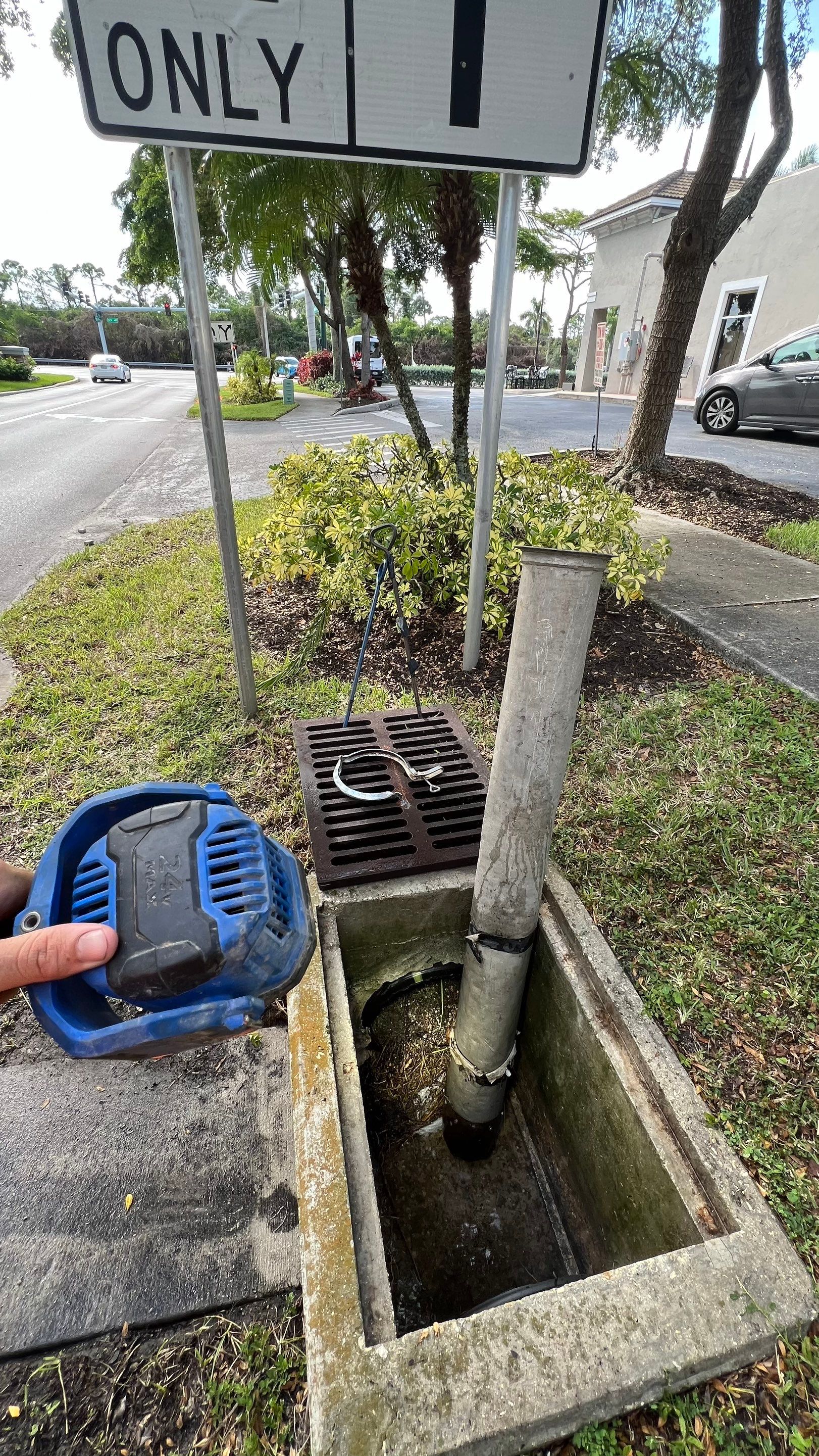 Naples Community Entry Road Stormwater System Cleaning by APS Power & Water