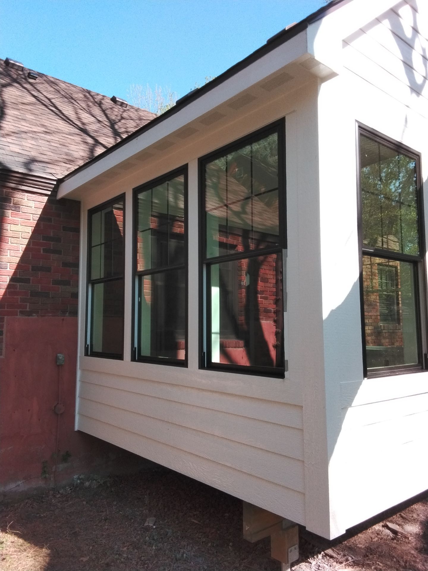 New 4 season room interior & exterior painting by Midwest Paint LLC
