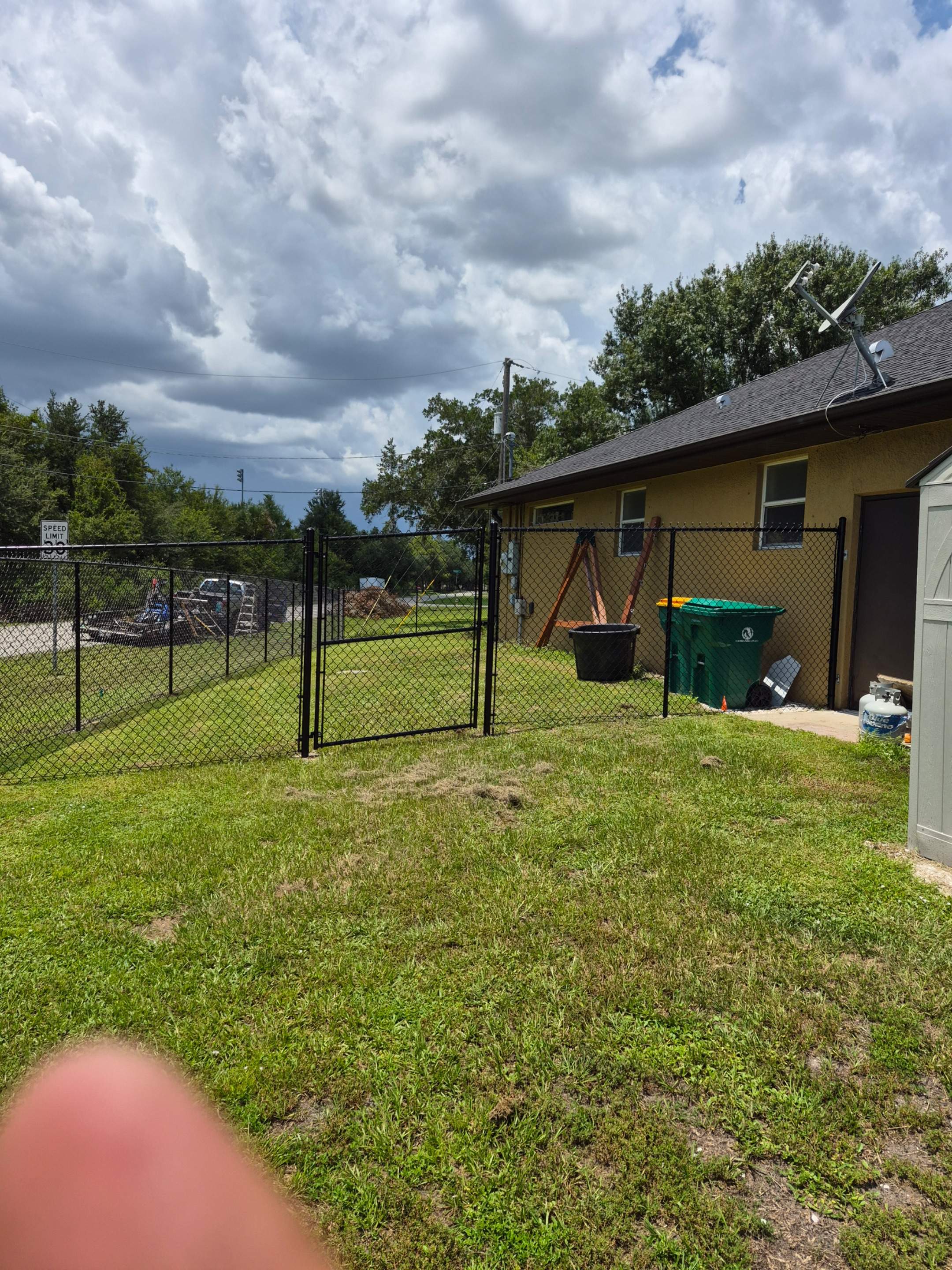 Black Chain Link Perimeter Fencing with Double Gates in Port Charlotte by True Fence LLC