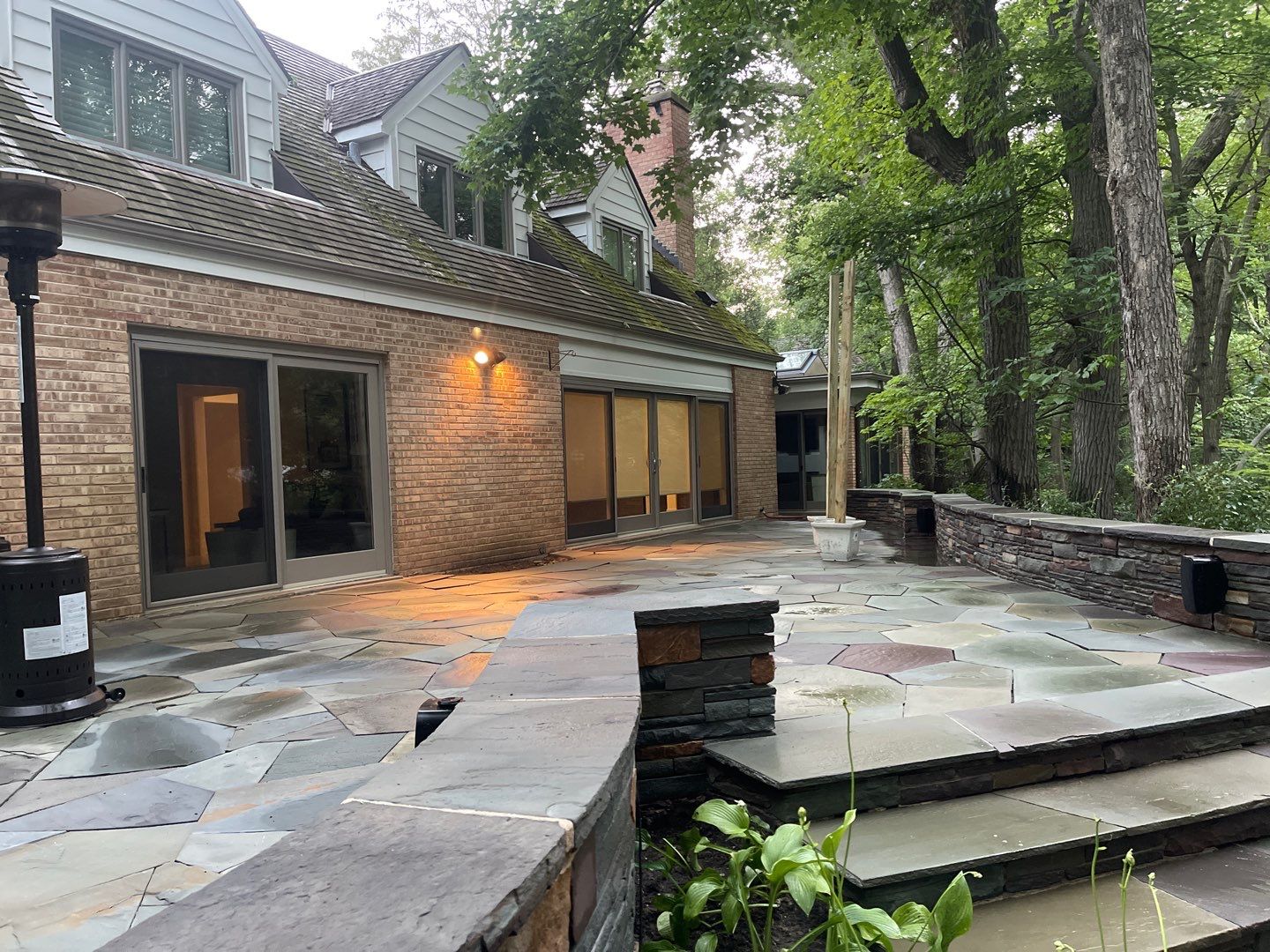Bluestone patio cleaning by Northern Power Washing LLC.