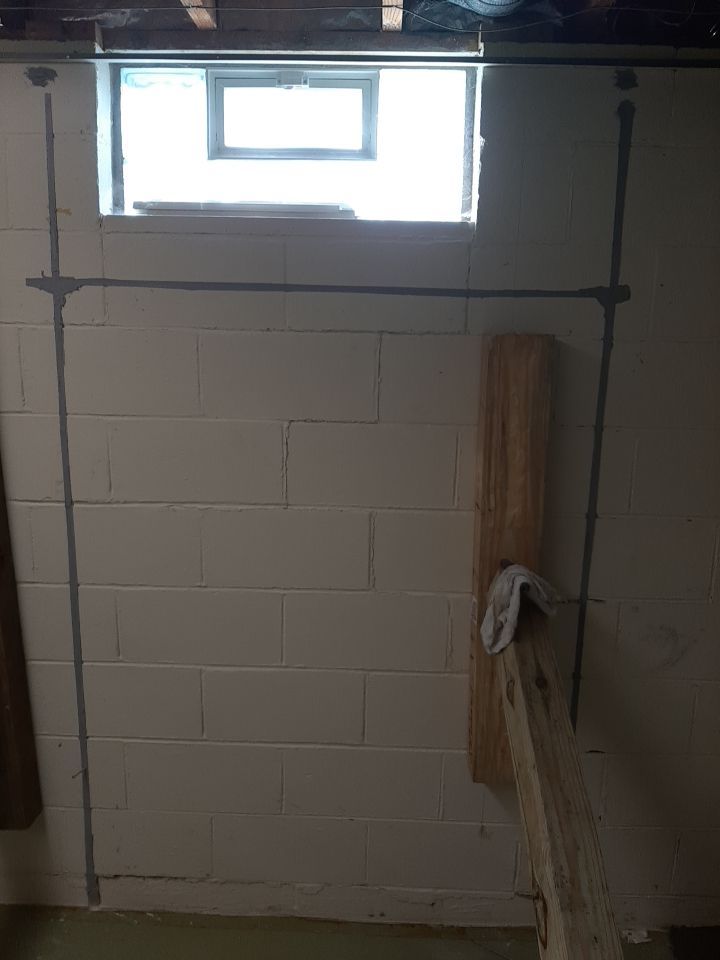 Wall Straightening and Reinforcement using Embedded Fiber Reinforcement by Toledo Basement Repair 