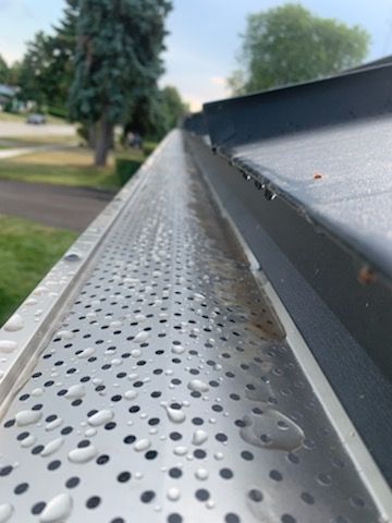 Residential Roofing Installation using 16" Standing Seam Panels by Jay Carter Roofing & Sheet Metal