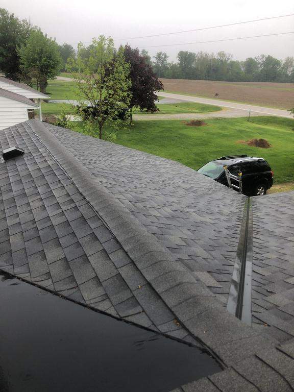 Residential Roofing Installation using 60 mil rubber roof  by Nitro Roofing and Construction