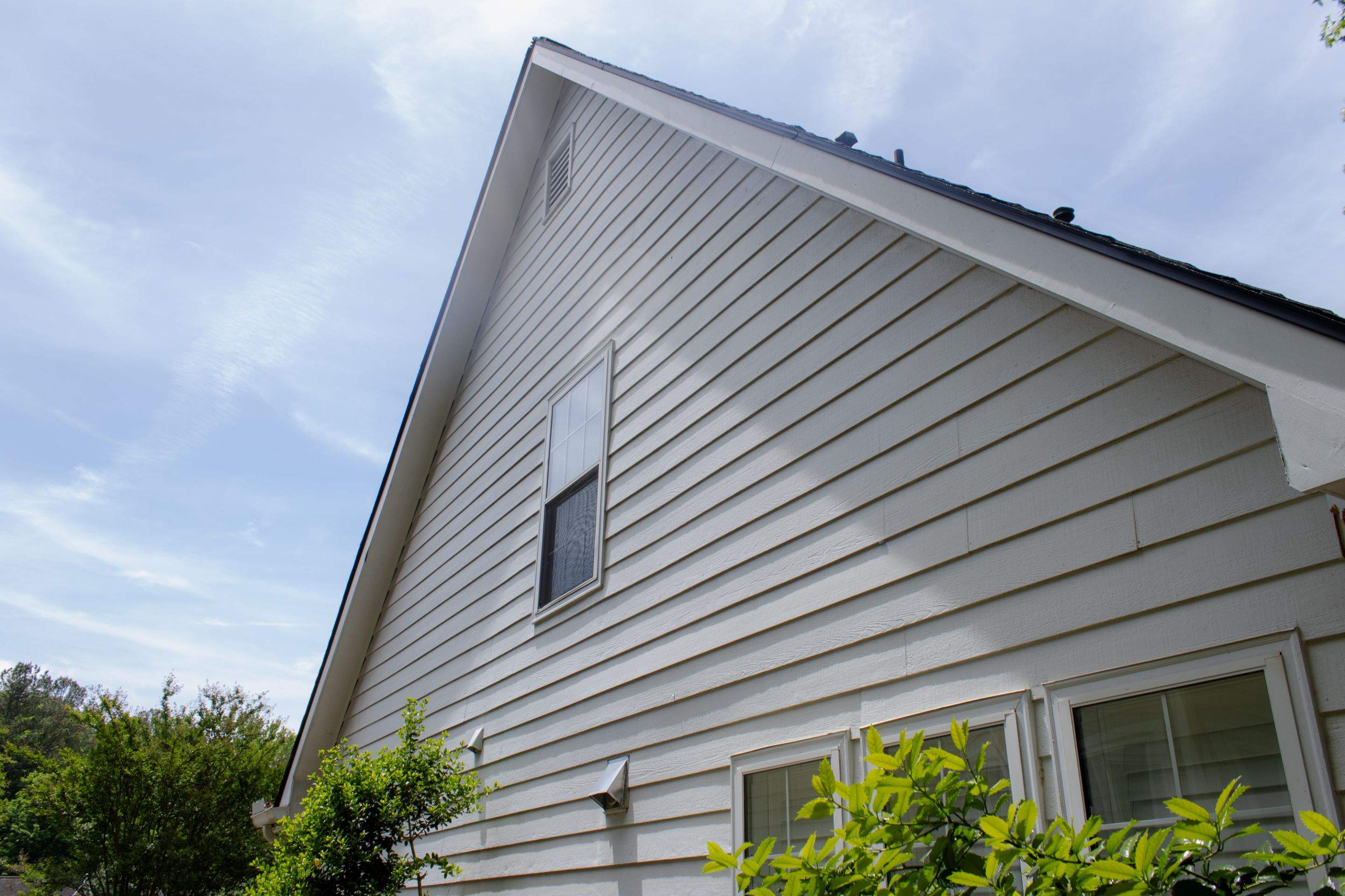 Alpharetta, GA Siding & Exterior Painting with Black Trim Before & After by Nelson Exteriors