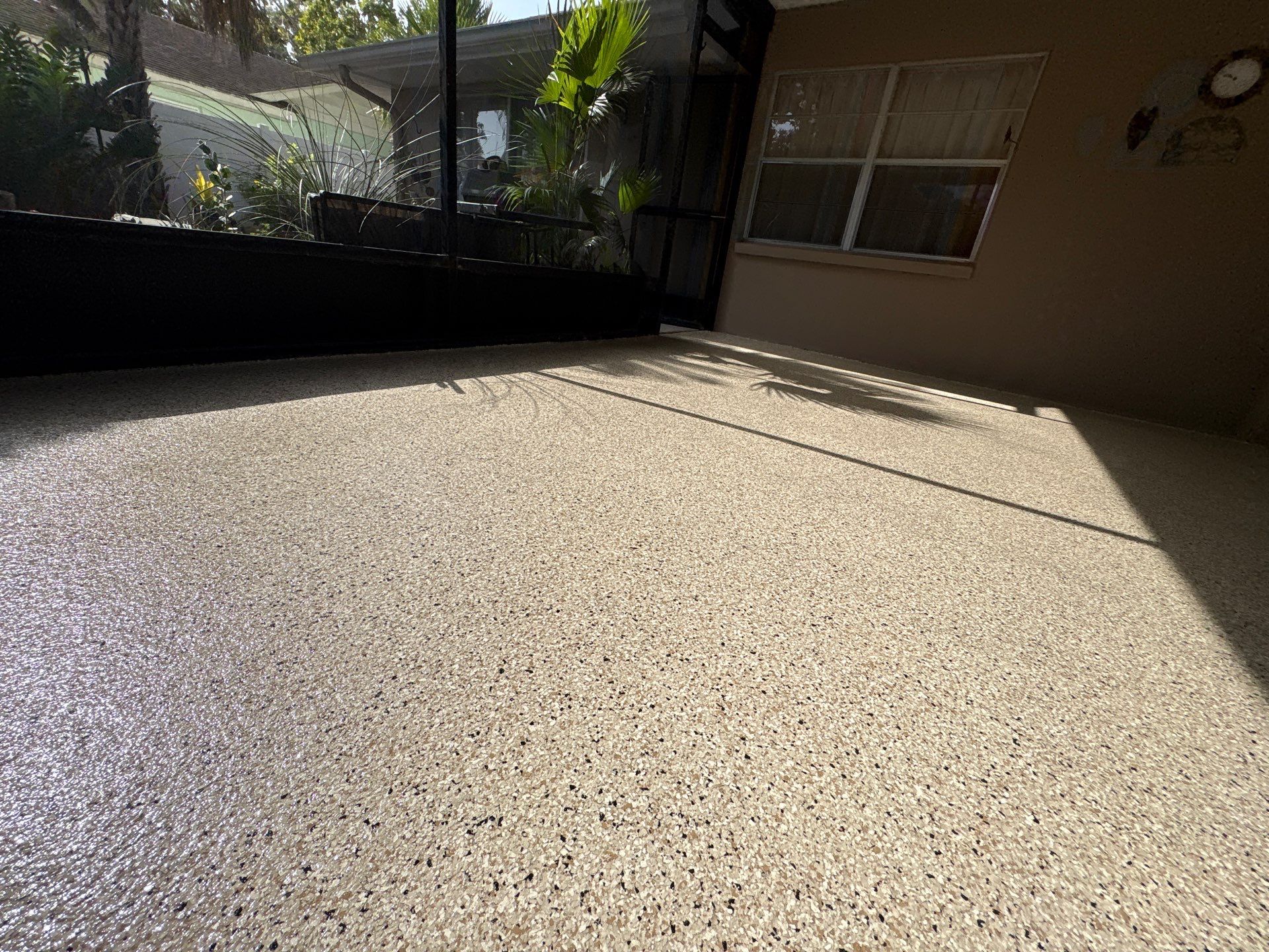 Garage and Screened Lanai Epoxy Floor Coating in Brandon by Performance Floors & Coating