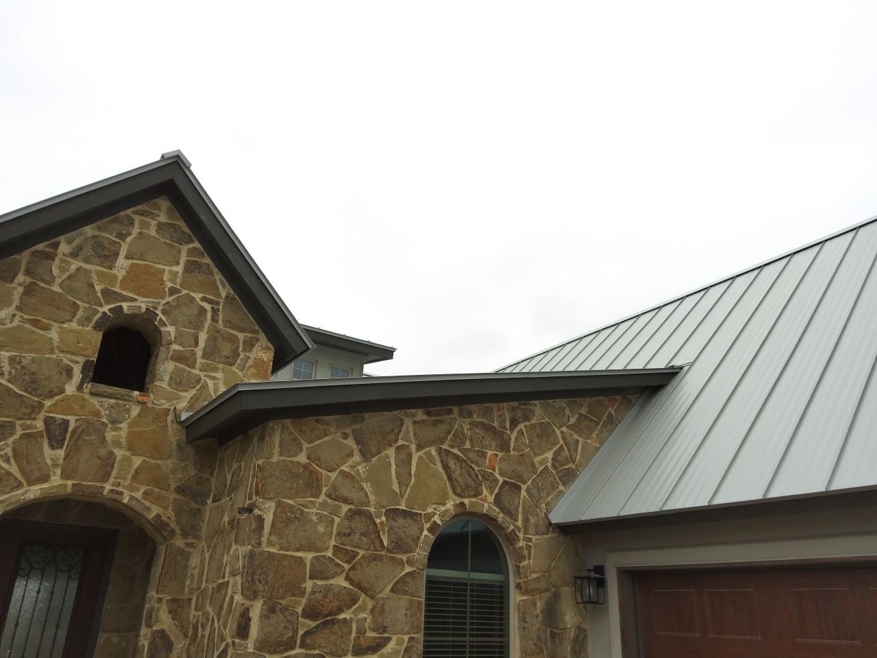 Residential Roof Replacement using 24 GA Double-Lock - Galvalume by Action Exteriors Austin