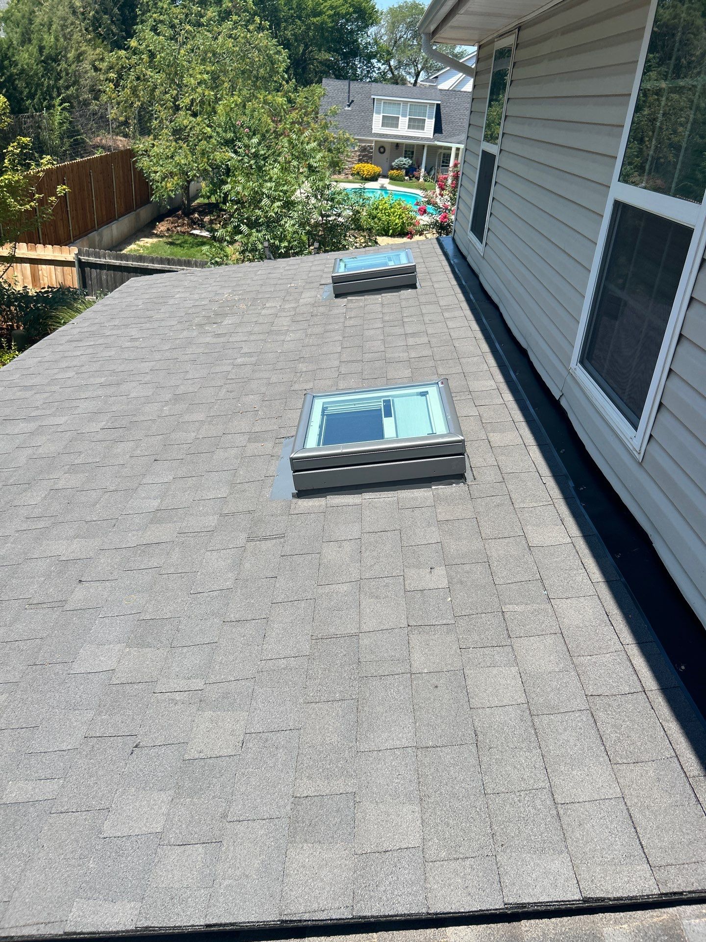 Roof Replacement and Skylight Installation in Norman, OK by McCann's Roofing and Construction