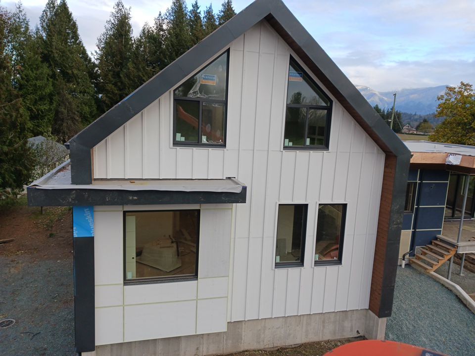 Residential Roofing Installation using multiple products by Top Notch Roofing Inc