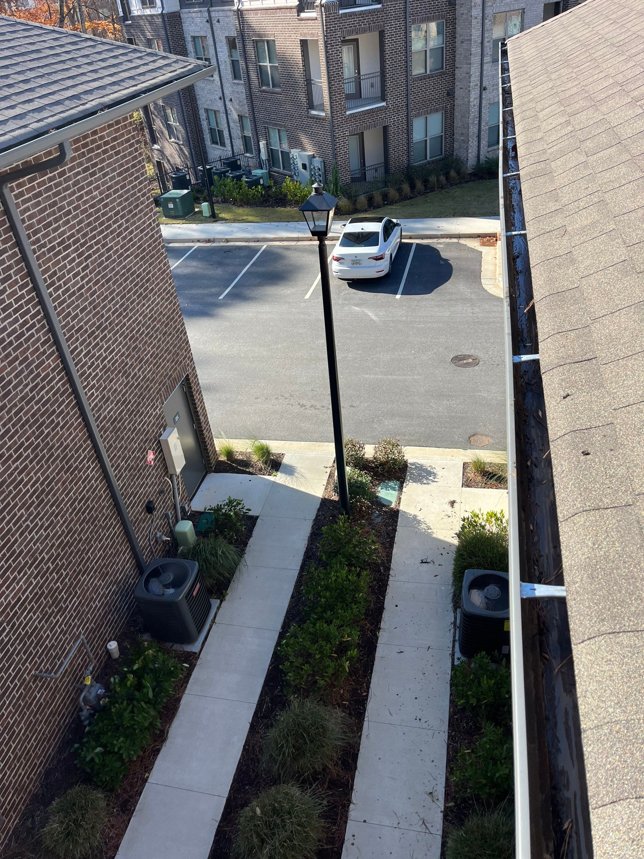 Commercial gutter cleaning Newnan & Peachtree City, GA after photo with clean gutters