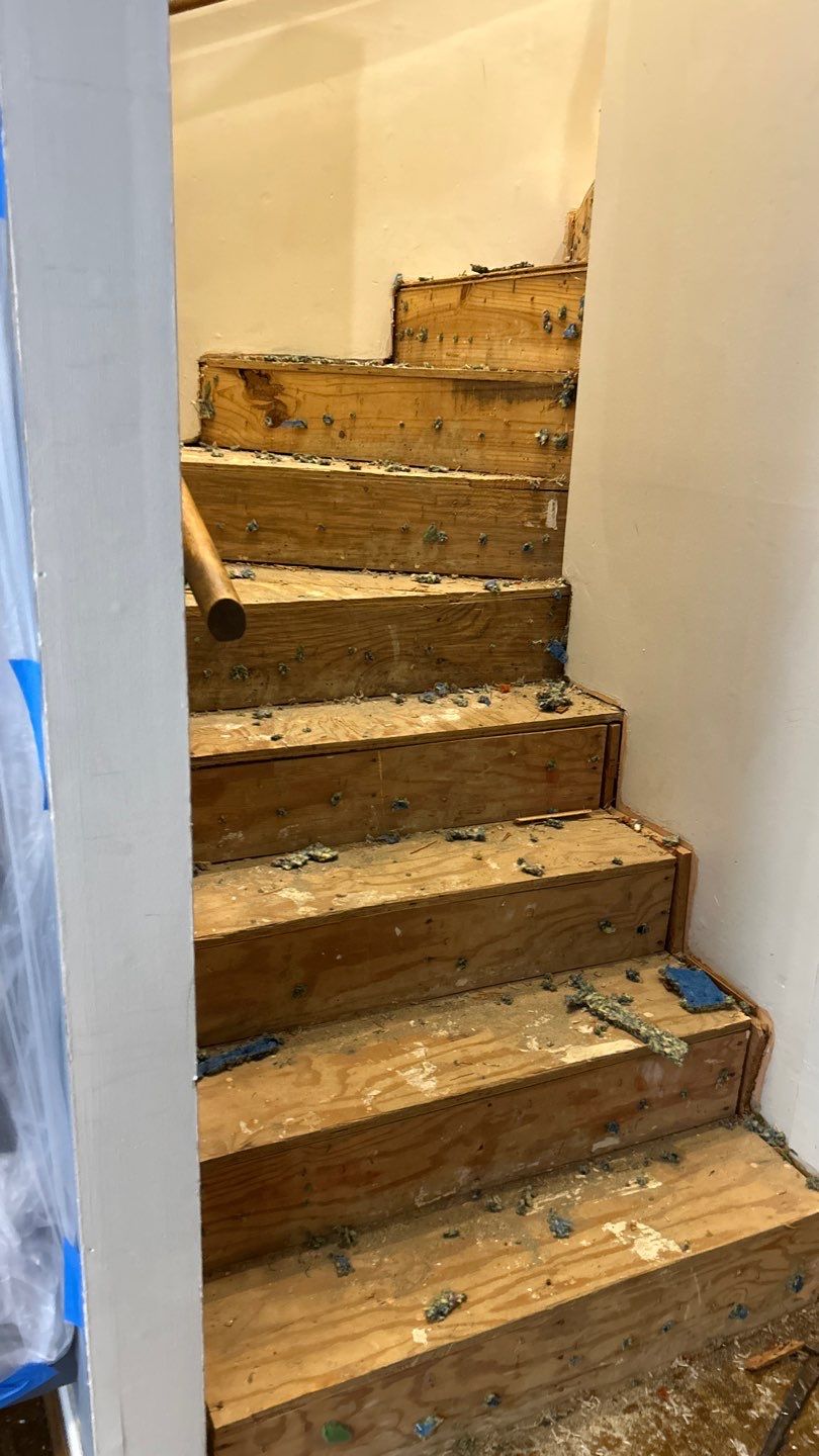 Parquet floor and stair treads by Footprints Floors of Nashville