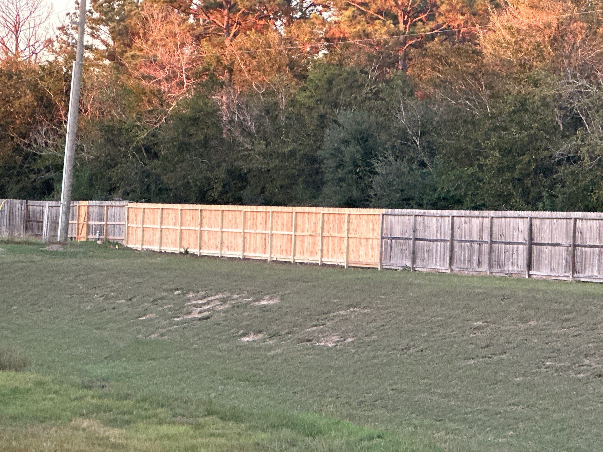 Premium Commercial Fence Installation with Western Red Cedar Pickets, 3 Rails, and Deluxe Wood Gates" by Tim's Fences