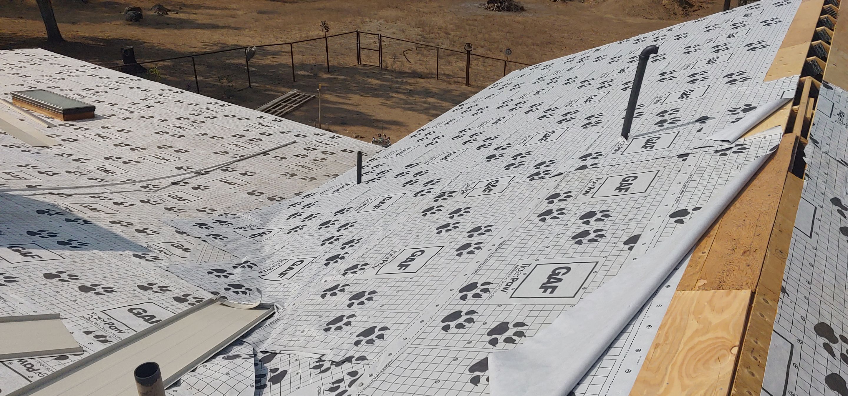 Residential Roofing Installation using Standing seam metal roofing system by Straight Edge Roofing Inc