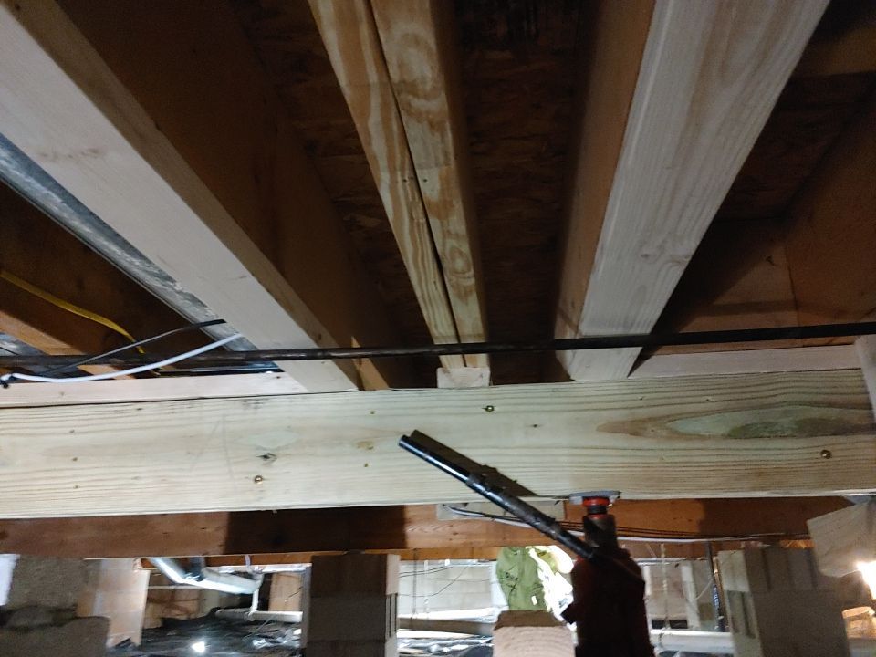 Crawl space encapsulation and Waterproofing using Structural Wood and Steel Reinforcements by Toledo Basement Repair 