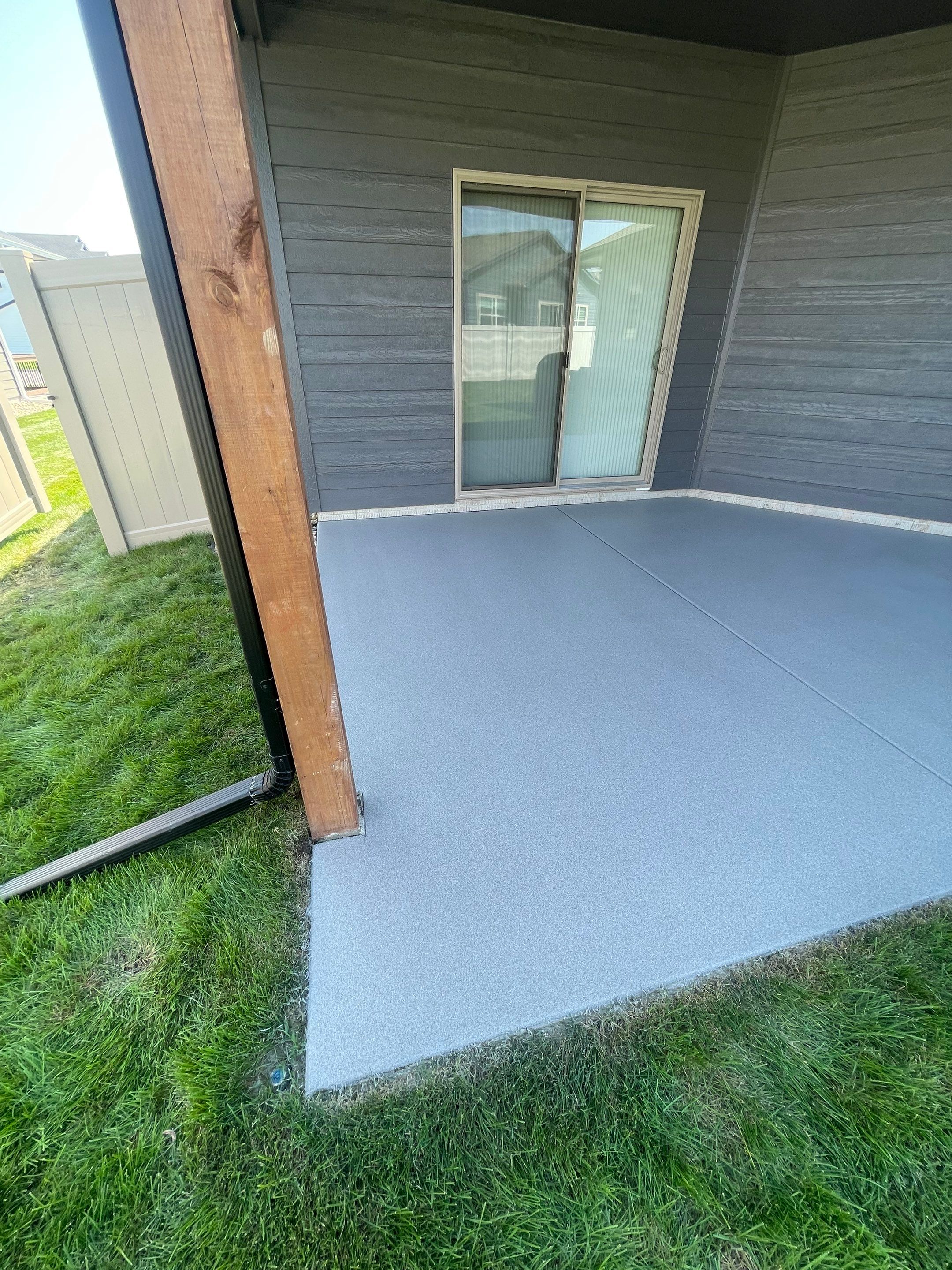 Sioux Falls Residential Concrete Patio and Walkway Coating by Select Painting, Coatings & Garage Cabinets