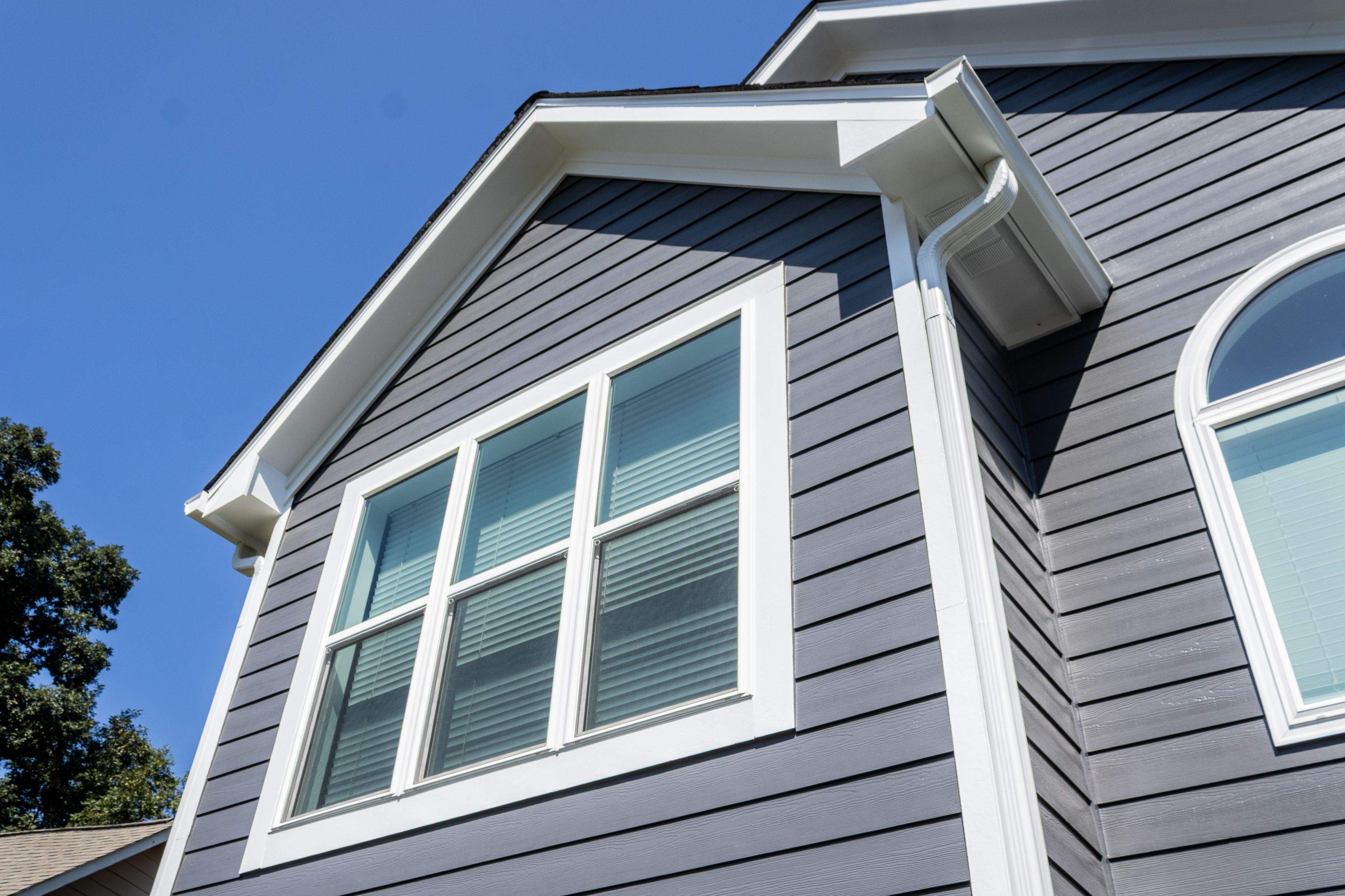 Lawrenceville, GA Full Siding Replacement, Exterior Painting, and Window Installation by Nelson Exteriors 