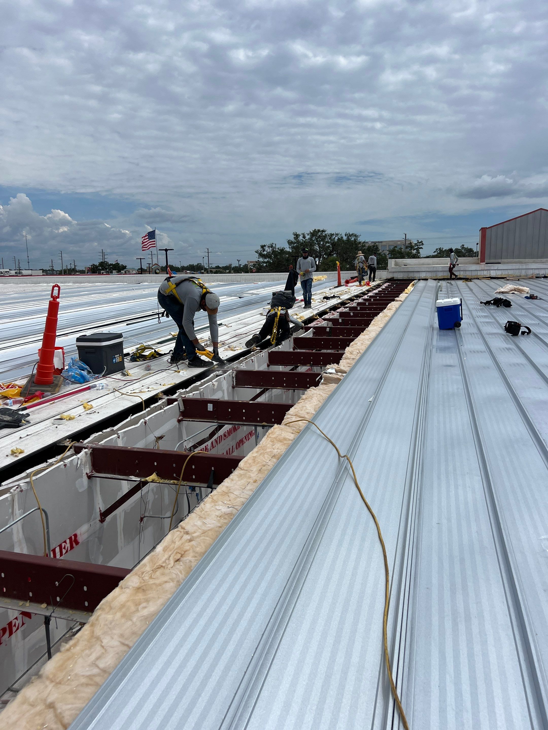 Commercial Metal Roof Replacement at Shopping Plaza in Port Charlotte by CES Roofing