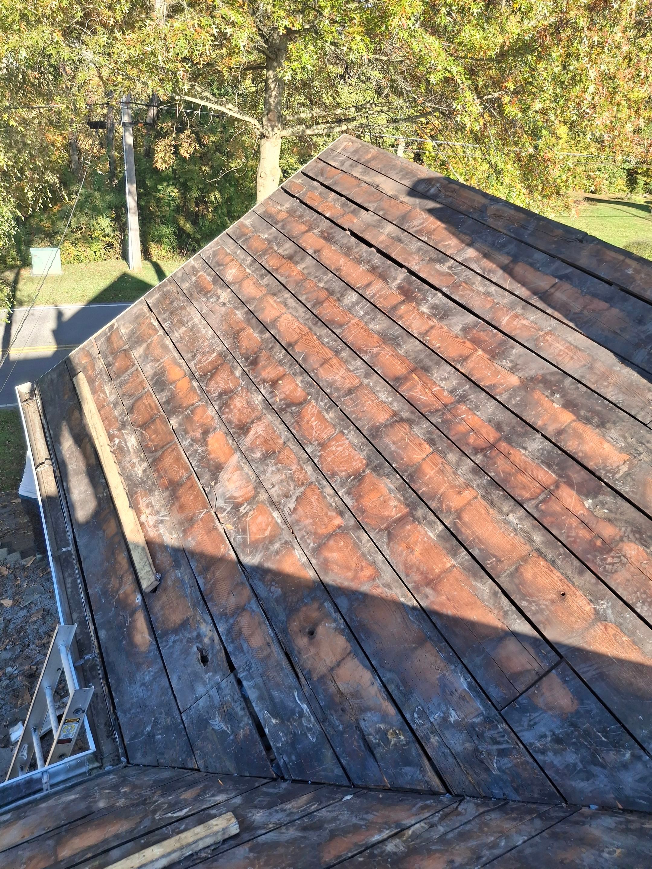 Residential Roofing Installation using Metal by Rainstoppers Roofing