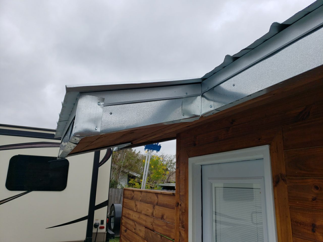 Gutter Installation using K-Style Seamless Gutters and Soffit and Fascia Replacement by Gutter Professors