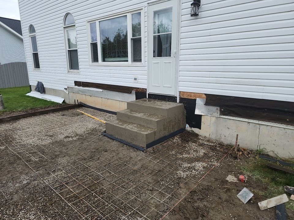 Stamped Concrete and Entry Door by Ivy Lea Construction