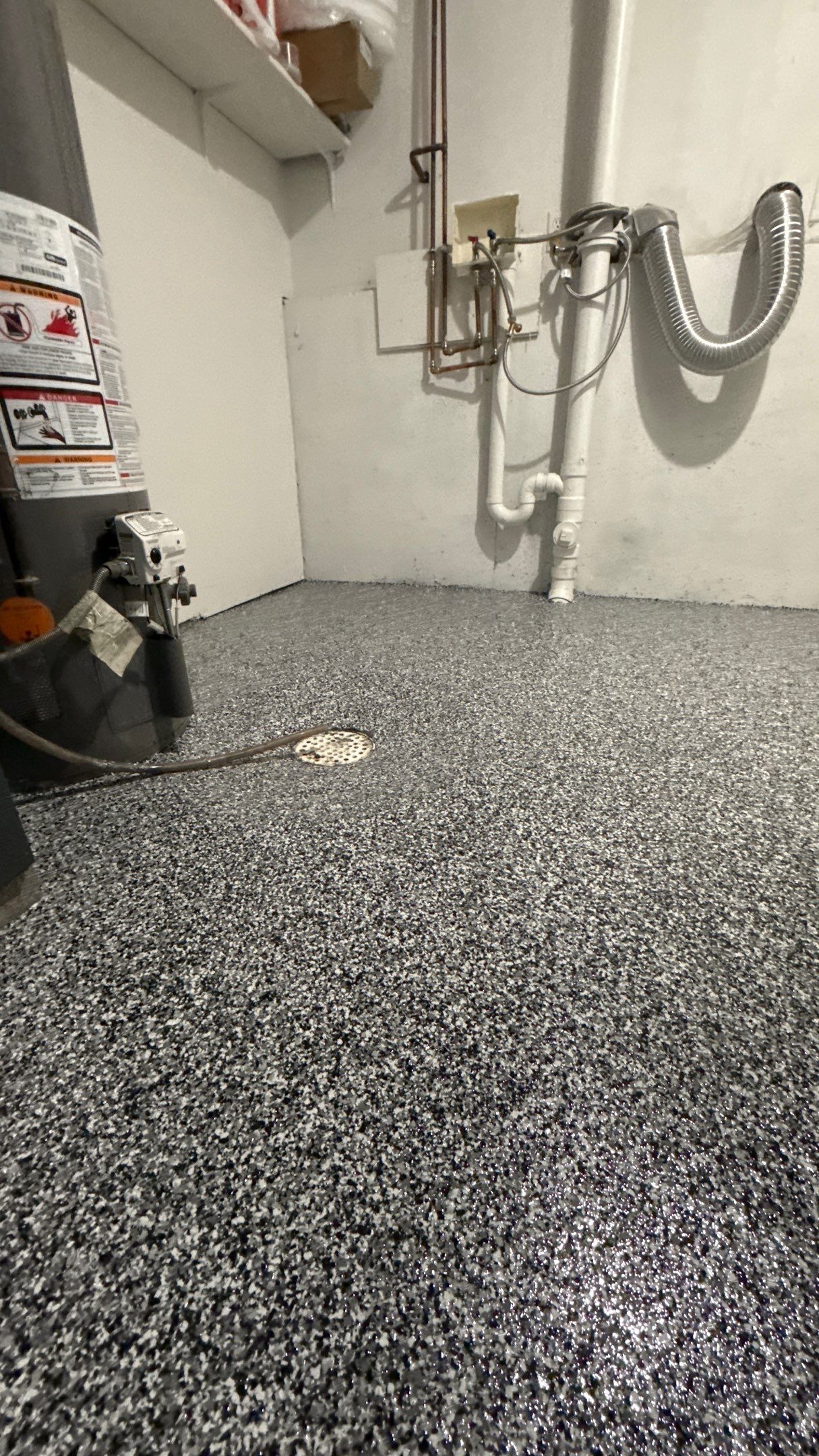 Epoxy Floor Coating for Edgerton Garage and Utility Room by Banner Garage