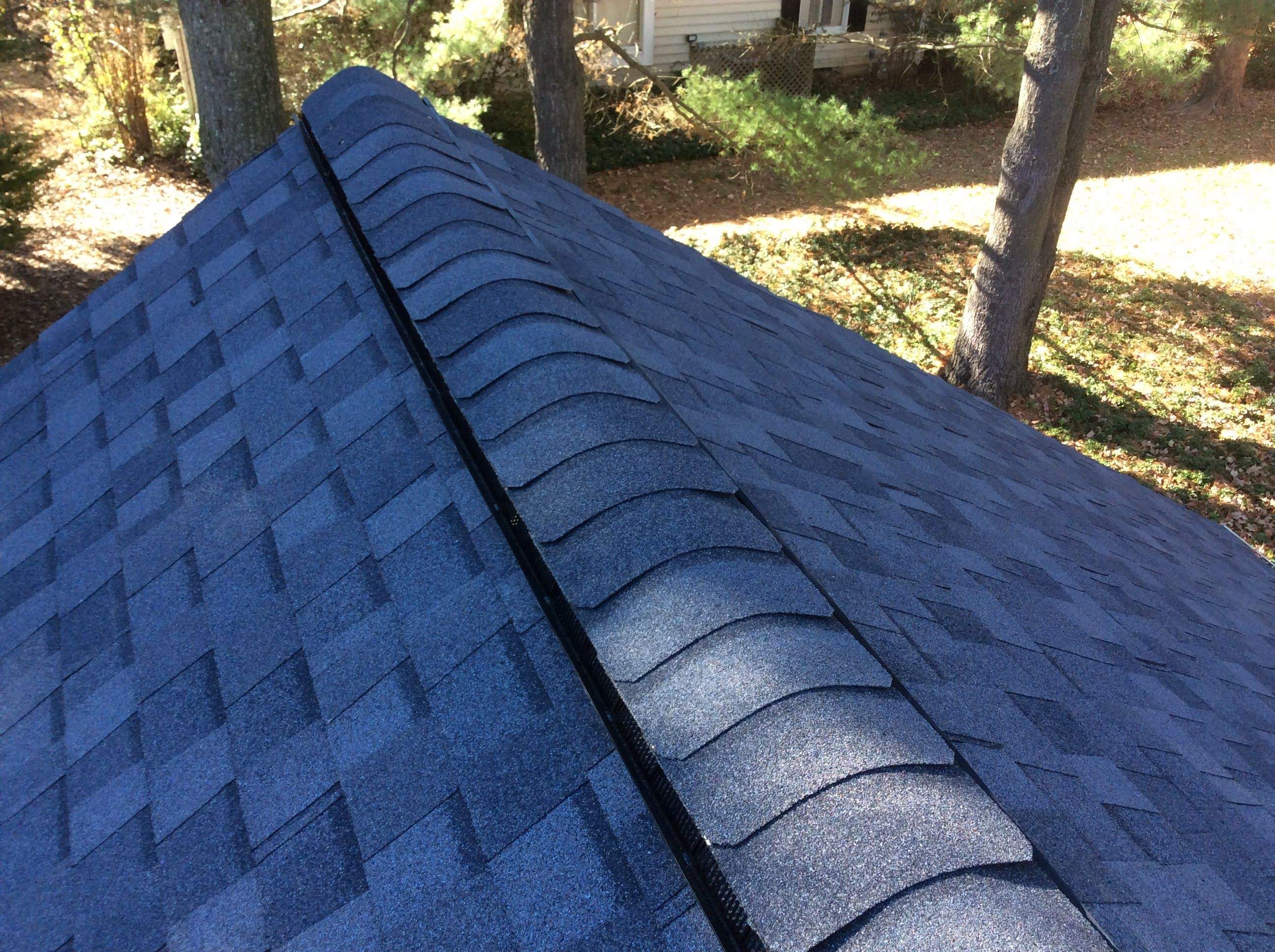 Residential Roofing Installation using Pewterwood Shingles  by Alpha Design Services