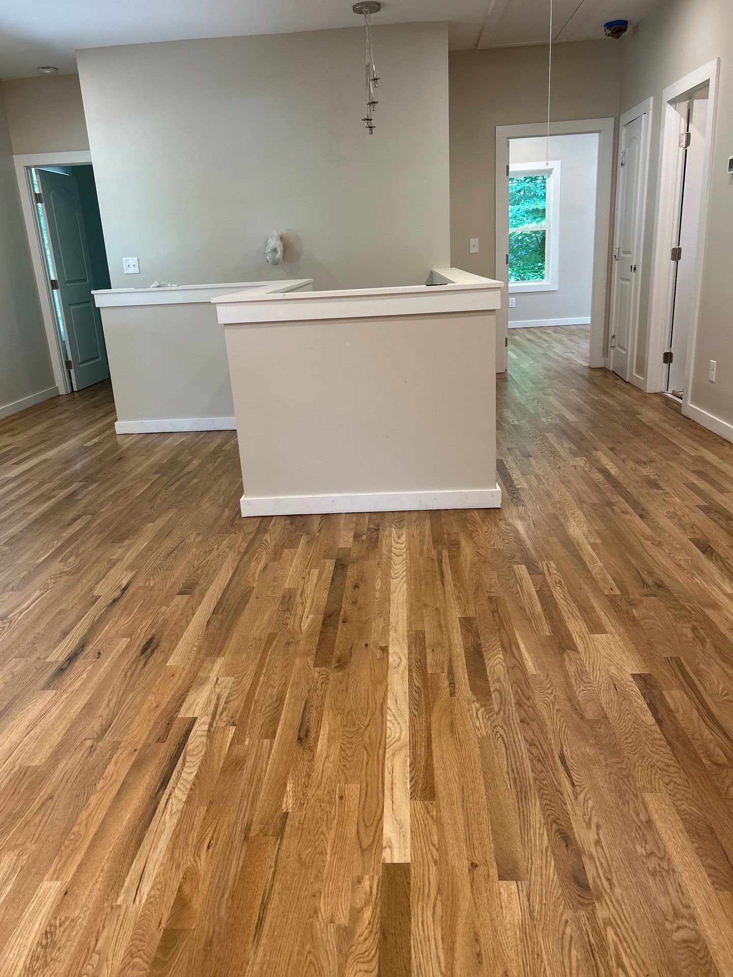 Remodel with existing and new white oak by Footprints Floors of East Atlanta