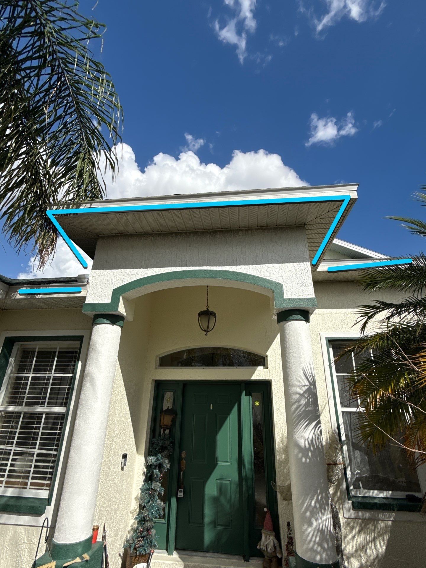 White seamless Gutters and downspout repair in Sarasota FL by Gutter Professors