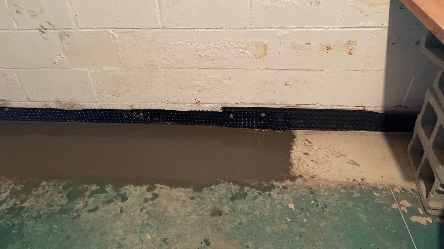 Completing the Connection for Lisa's Drain Tile System by Waterproofing Northeast