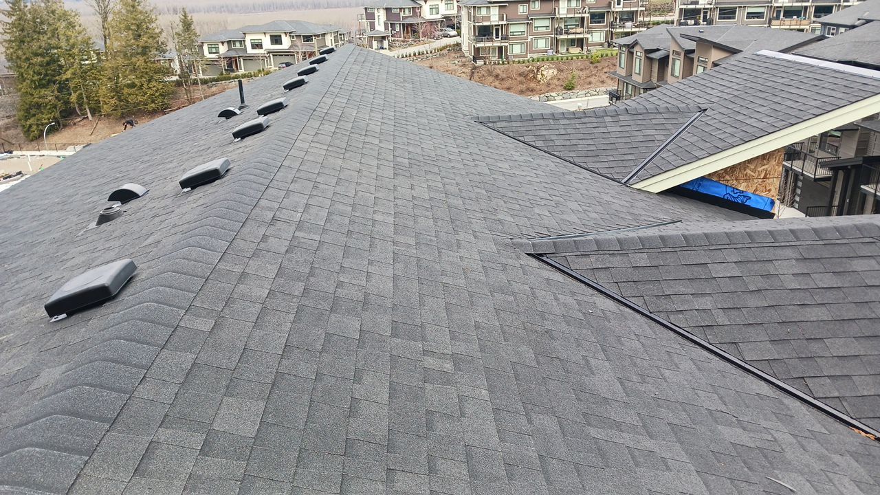 Residential Roofing Installation using OC Oakridge shingles by Top Notch Roofing Inc