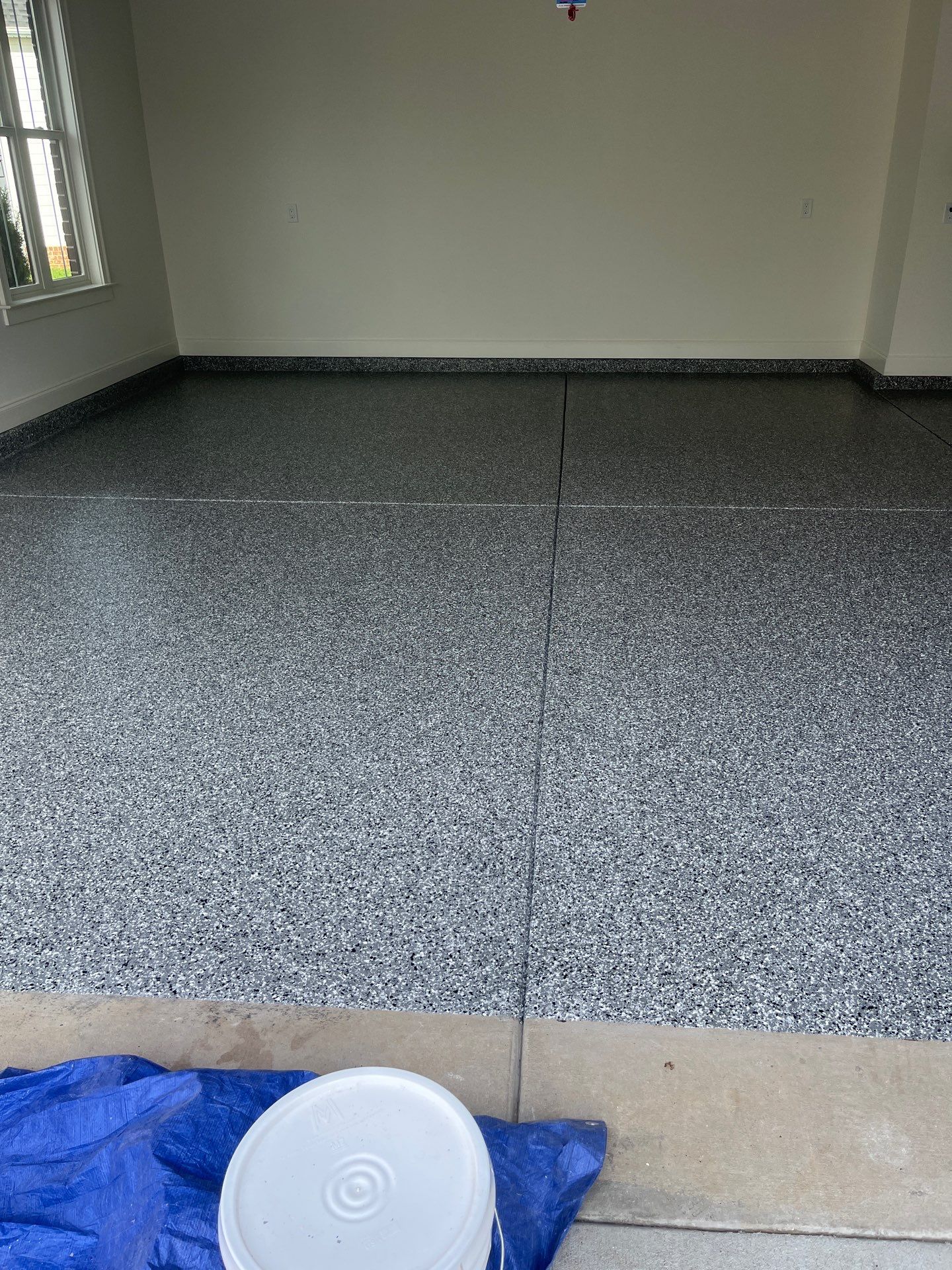 Garage Floor Coating using Wombat by My Garage Floor Guys