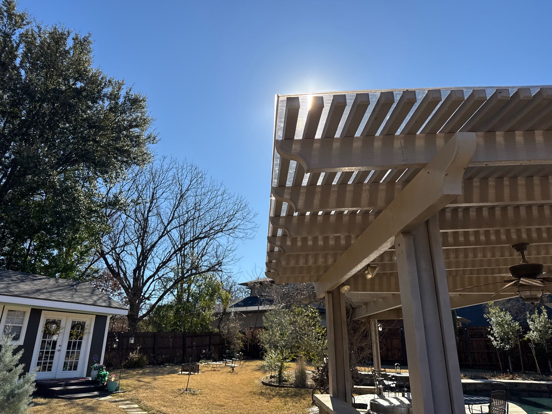 Polygal twin wall roofing system using 8mm bronze twin wall polygal by Grizzly Fence And Patio