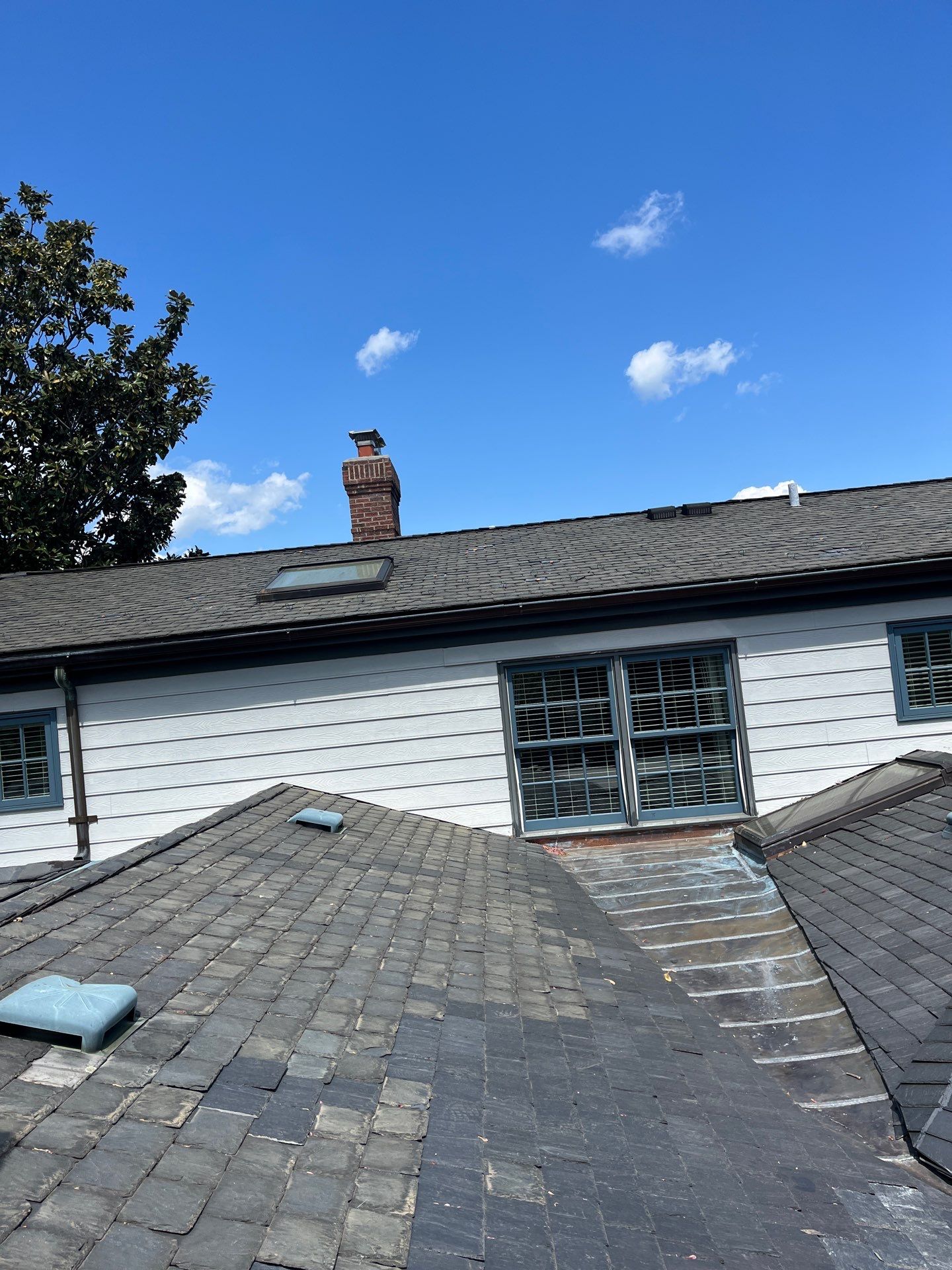 Arlington: Buckingham Slate and Carlisle Syntec TPO Roof by RM Banning, Inc.