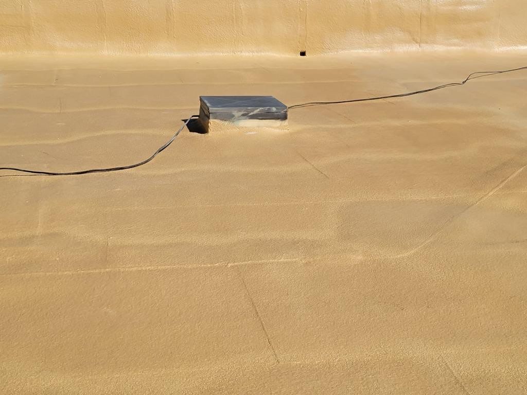 Spray foam and coatings using Conklin Benchmark/PUMA XL coatings and spray foam by Straight Edge Roofing Inc