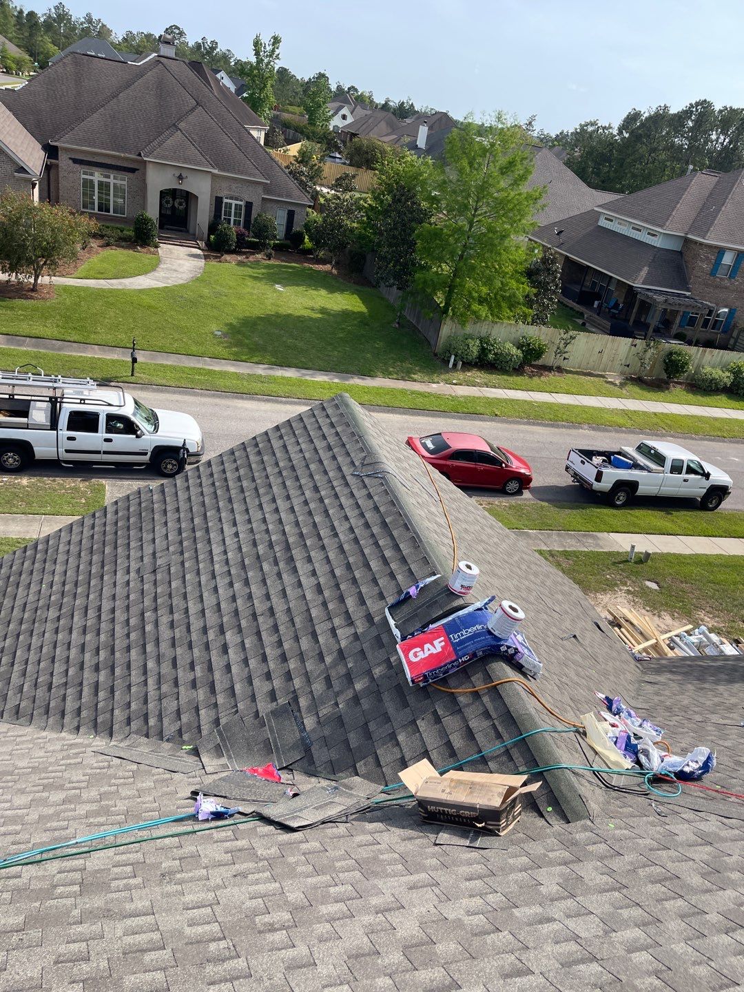 Residential Roofing Installation using Roof Replacement by American Roofing & Construction LLC