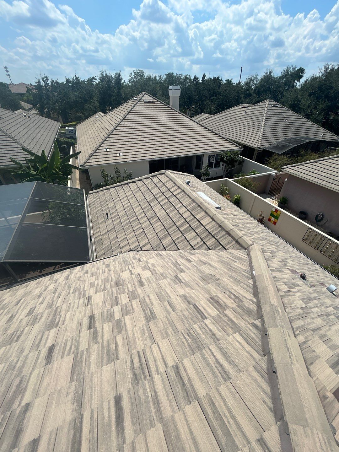 Concrete Tile Roof Repair and Gutter Maintenance in Orlando by Fortified Roofing Solutions Corp.
