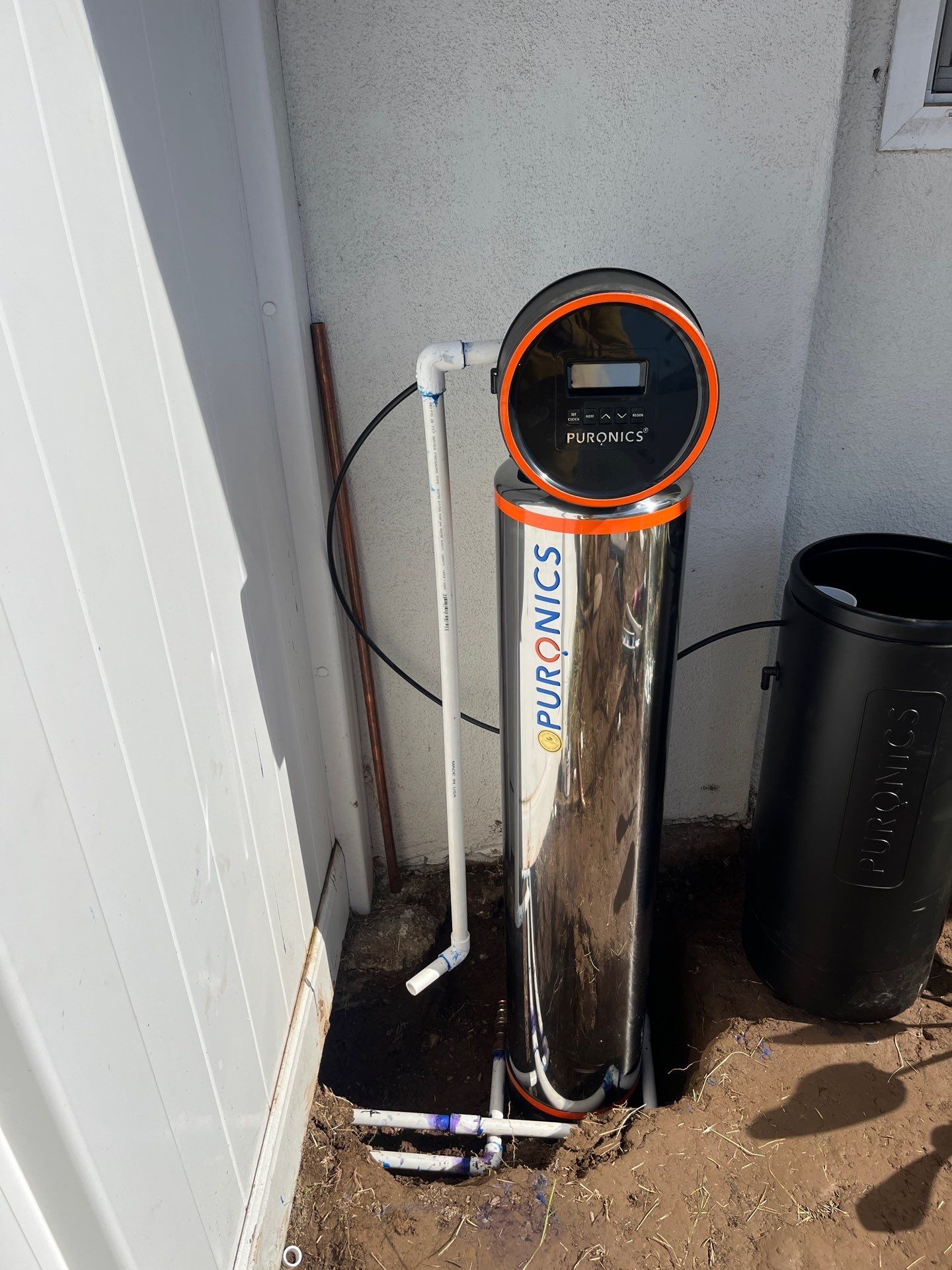 Installing Water Treatment by Us Plumbing