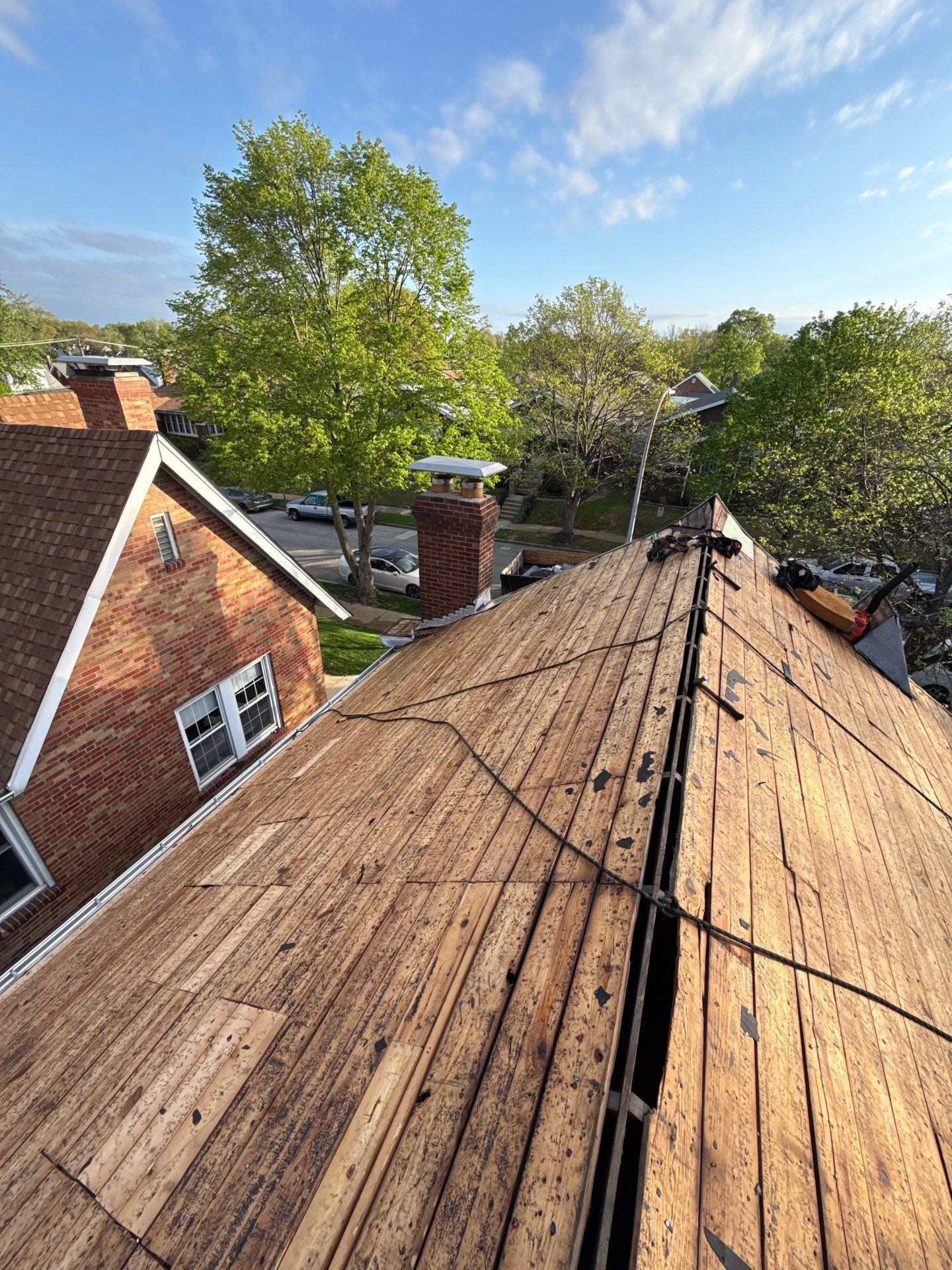 Full Residential Roof Installation and Detached Garage Shingle Replacement in St. Louis by Acute Roofing And Exteriors 