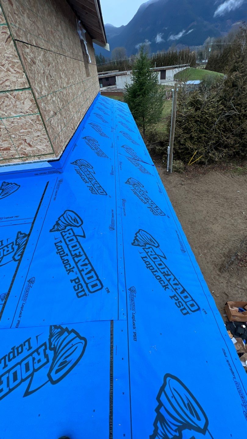 Residential Roofing Installation using 16" Prolok metal and Owens corning shingles by Top Notch Roofing Inc