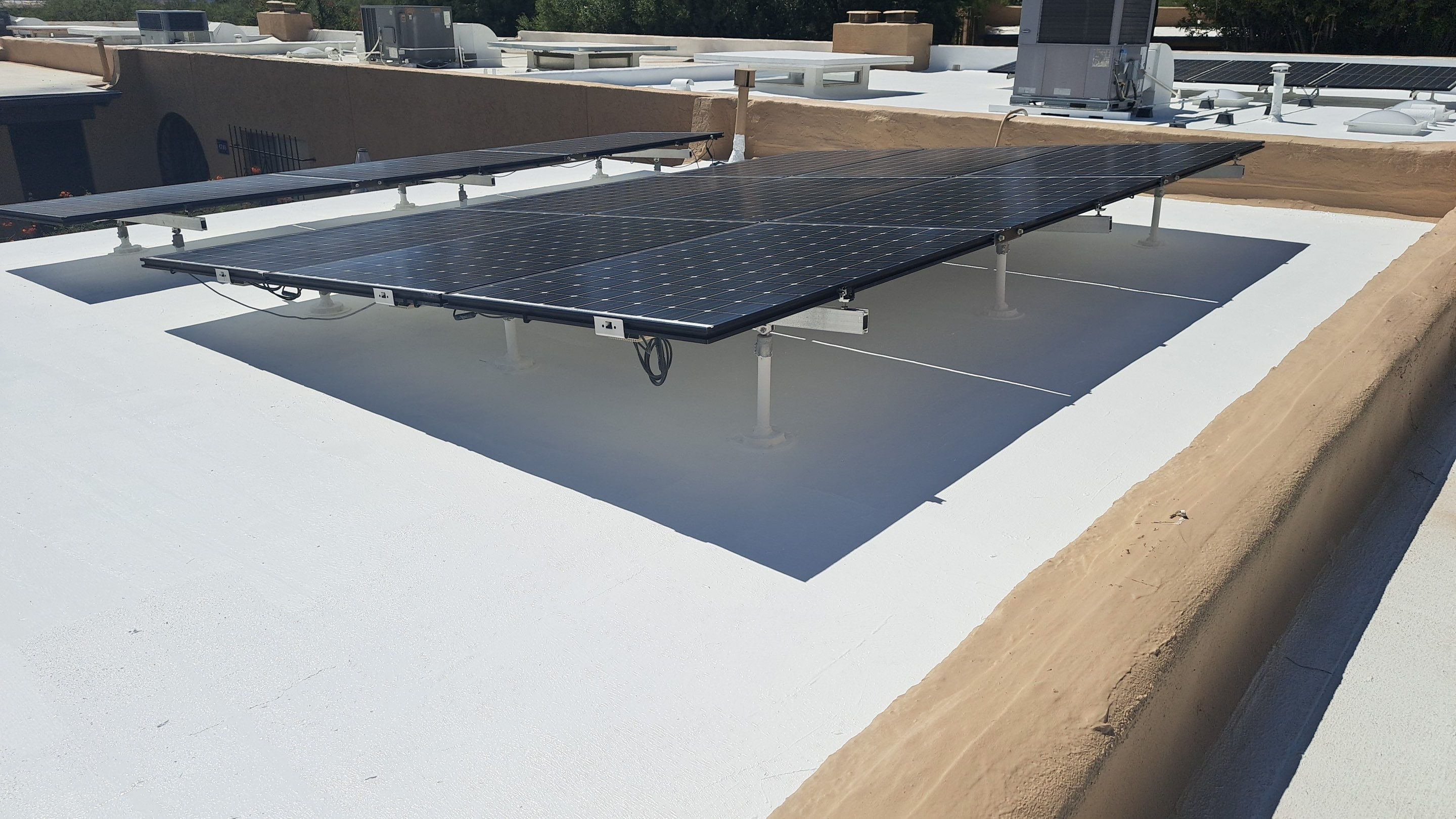 Tucson Residential Low Slope Roof Restoration and Solar Installation by West Coast Roofing AZ