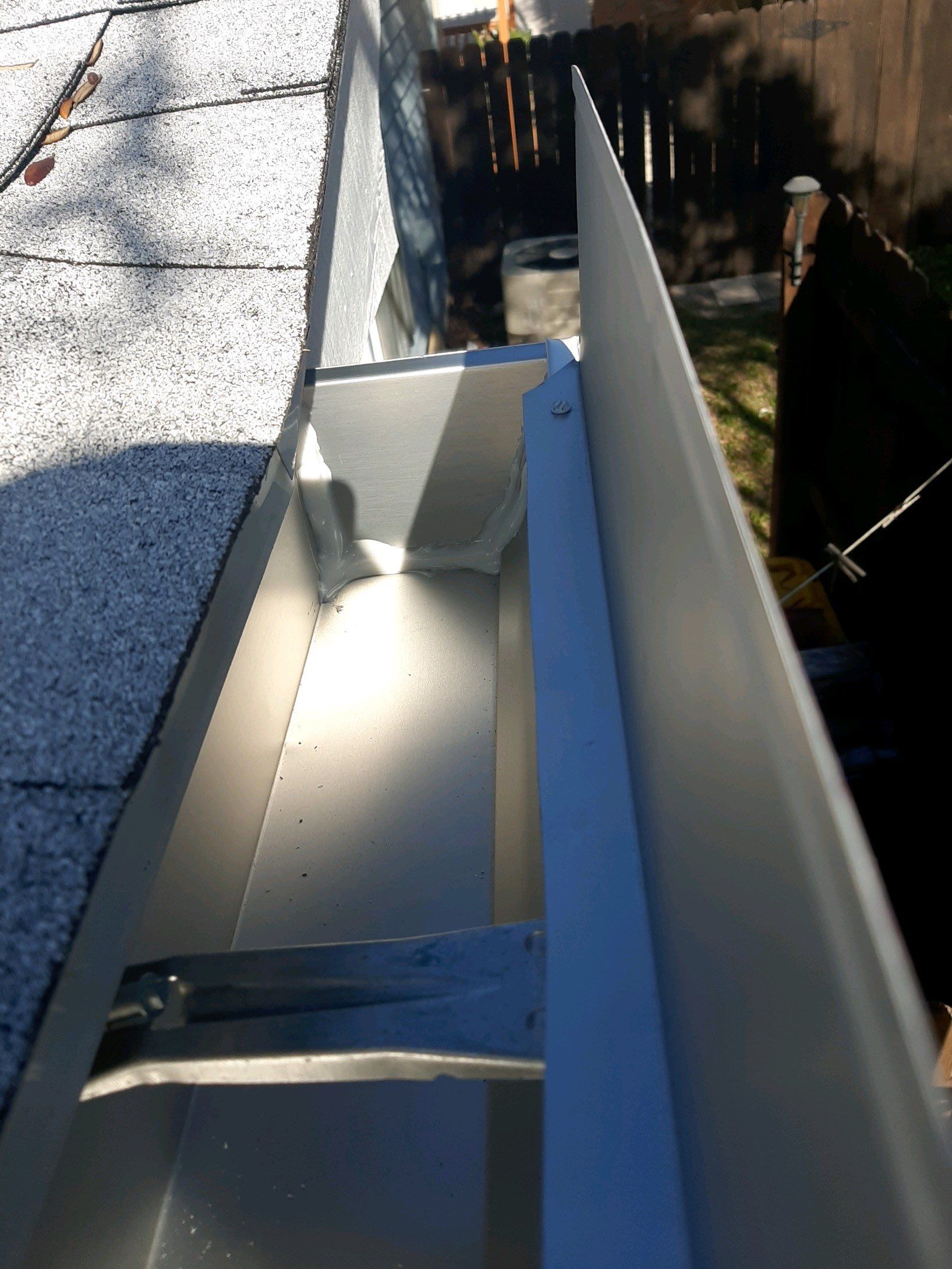 Seamless Gutter Installation Using White K-Style Gutters  by Gutter Professors
